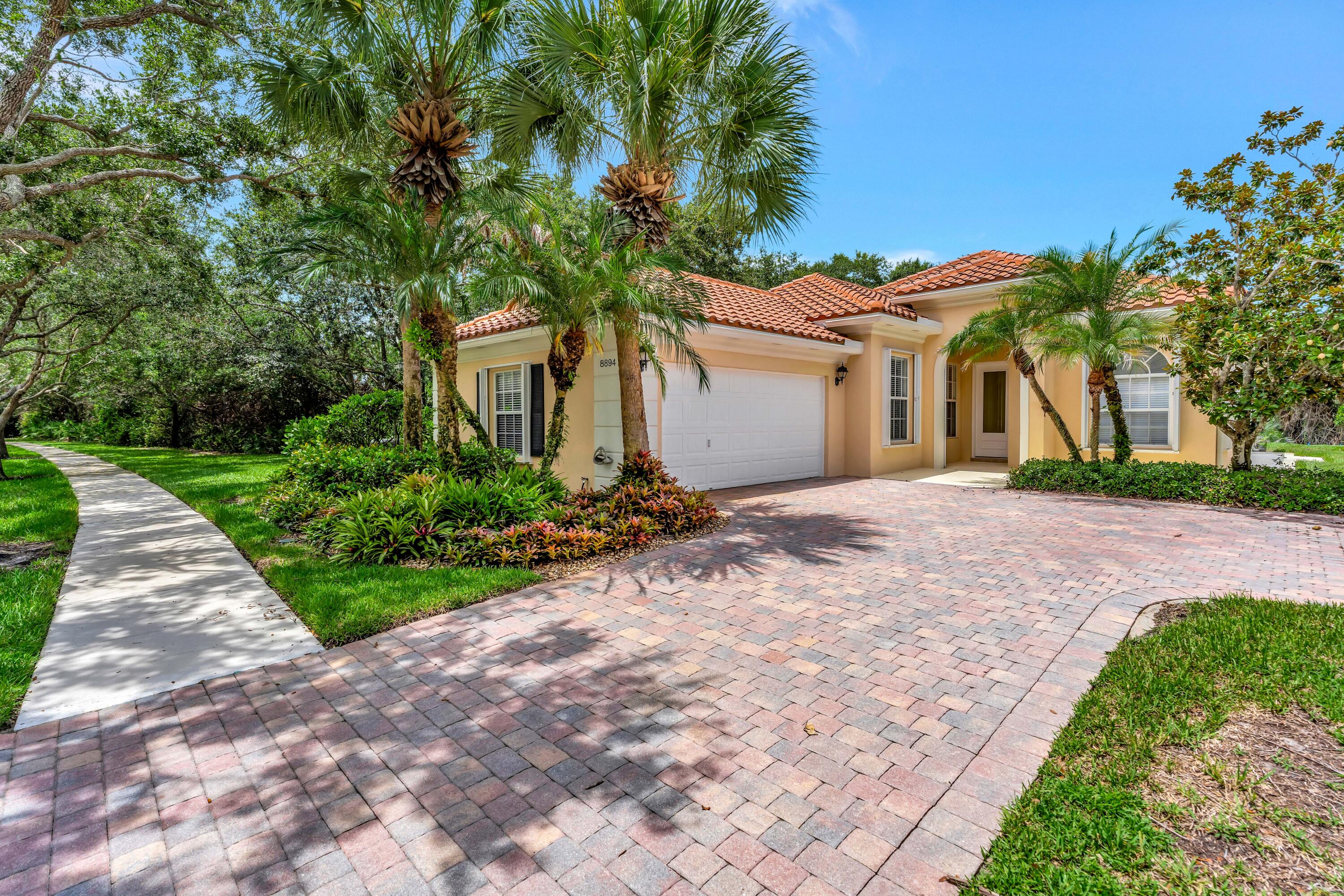 Pristine, move-in ready 3BR/2BA Oakmont floorplan in The Retreat at Seabranch — everything completed! New roof (2023), new AC (2022), tile throughout including the garage, accordion storm shutters. Private screened pool, freshly painted deck. Community amenities: clubhouse, pool, fitness center, tennis. Minutes to Hobe Sound and Jensen Beach beaches. Turnkey and priced to sell.