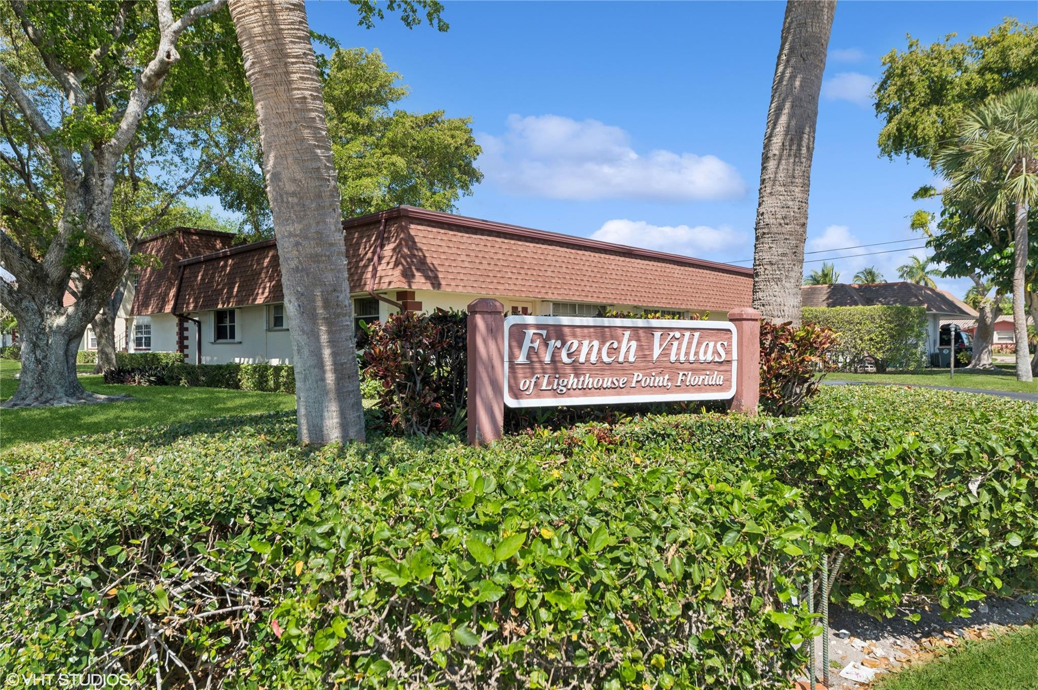 BEAUTIFUL 2 BEDROOM-1 FULL & 1 HALF BATH CONDO IN SOUGHT AFTER FRENCH VILLAS (EAST OF US1) IN PRESTIGIOUS LIGHTHOUSE POINT-CONDO IS A CORNER UNIT ON THE SECOND FLOOR. BEAUTIFUL WOOD LAMINITE FLOORS IN MAIN LIVING AREA- GOURMET KITCHEN FEATURES: GRANITE TOPS,LOADS OF CABINETS, BLACK STAINLESS STEEL APPLIANCES (APPROX. 3 YRS NEW) BIG DINETTE-MASTER BEDROOM  HAS LARGE WALK-IN CLOSET-BOTH BATHROOMS ARE REMODELED- LOTS OF WINDOWS PROVIDE NATURAL LIGHT. SPACIOUS LIVING ROOM-AC & WATER HEATER ARE (APPROX.5 YRS)- SEPARATE STORAGE ROOM IN BREEZEWAY- WINDOW TREATMENTS STAY.-ACCORDIAN SHUTTERS FOR ALL WINDOWS- ASSIGNED PARKING SPACE &GUEST PARKING-AMENTIES INCLUDE: CLUBHOUSE, BILLIARD ROOM AND POOL-CLOSE TO BEACHES, INTERCOASTAL, RESTAURANTS,PARKS AND SHOPPING. I-95 AND TURNPIKE. SHOWS LIKE A MODEL!!