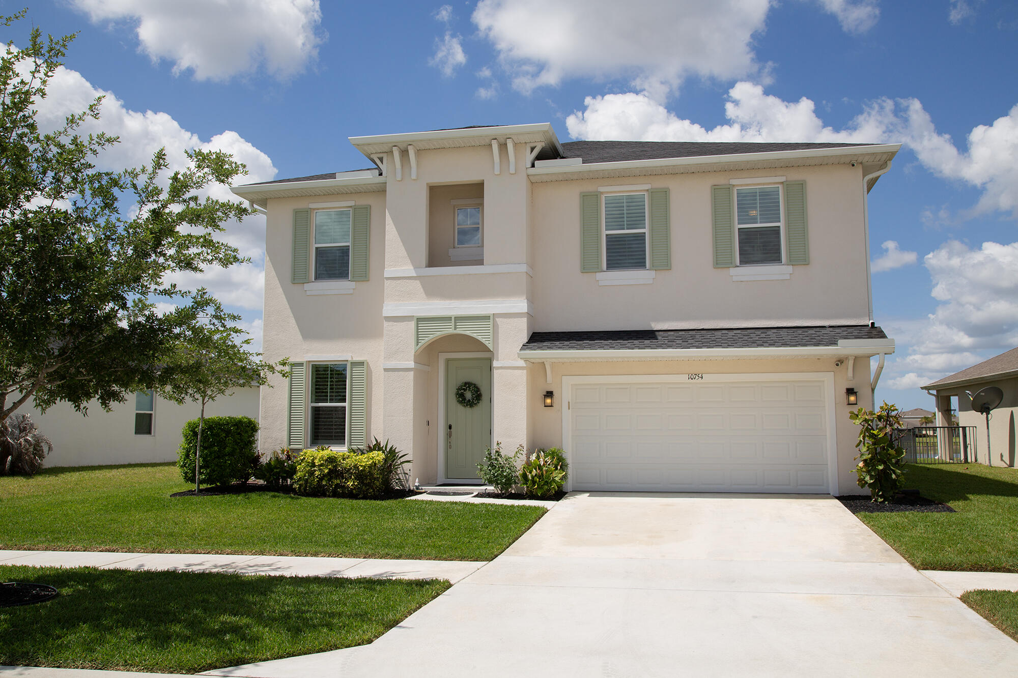 Better than new construction!  Come by to see this beautiful 4 bedroom, office, 3.5 bath home in Crosstown Commons!  Amazing open concept, high ceilings, gorgeous kitchen with quartz countertops, stainless steel appliances, and large walk-in pantry.  Relax on the back patio with a beautiful pond view!  Large fenced in area in the back for your pets!  Gorgeous master suite with plenty of closets with amazing custom cabinets and a lovely master bath!  First floor office, AND another office nook in kitchen, with nice size bedrooms on the second floor! Super close to shopping, dining, and top-rated schools!  Storm windows!  LOW HOA!  Very nice community pool in walking distance!  Come by to see this move-in ready beauty and make it yours!