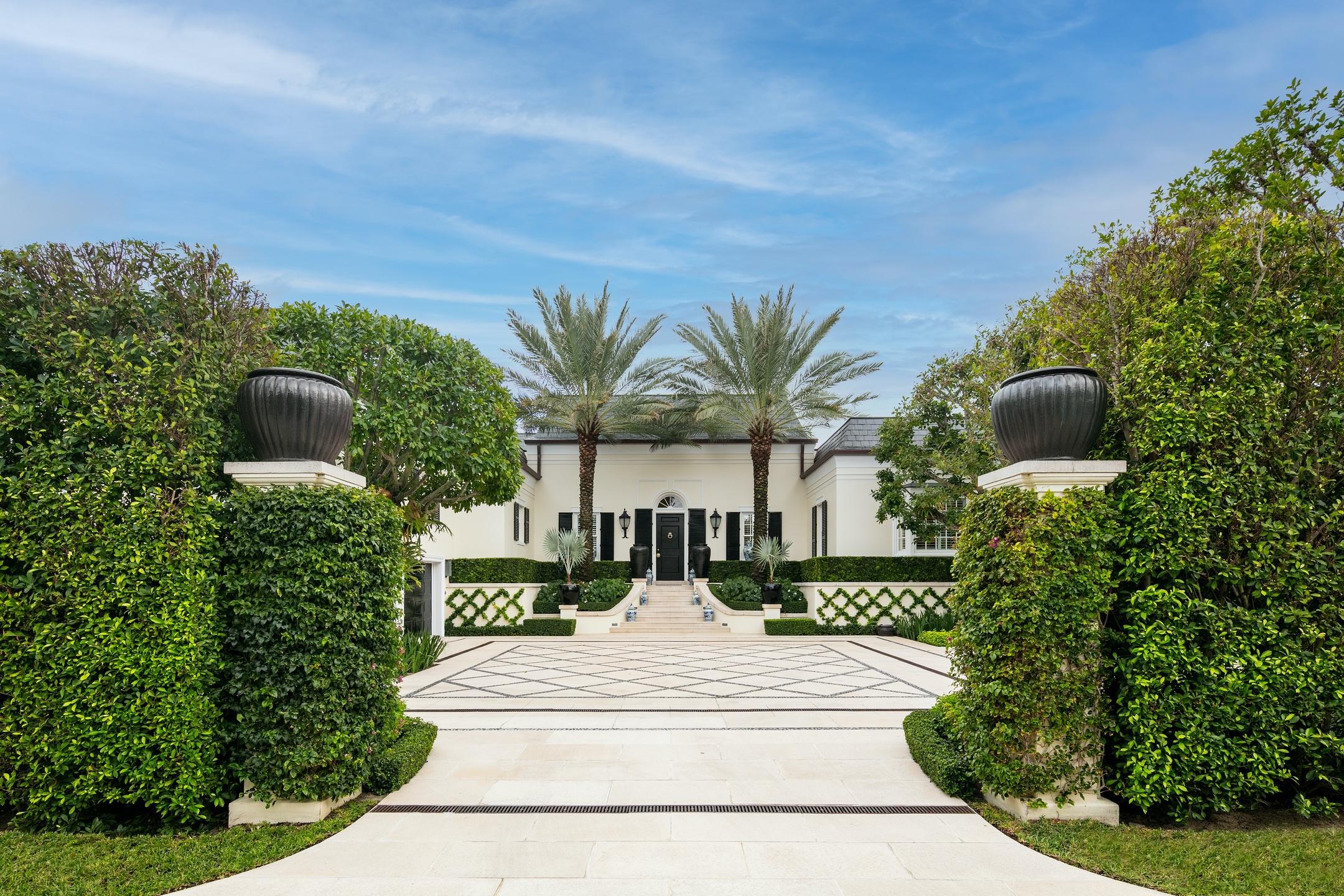 This magnificent classic Regency has been meticulously reimagined to create a truly special and unforgettable home that's perfect for both formal entertaining and daily life. Upon arrival you will be taken by this homes stately grandeur and impressive scale. Dual offices flag either side of the formal entry foyer, which connects the East and West wings of residence . The great room, with soaring 18' ceilings is as dramatic as it is comfortable. Other features include a stunning modern chefs kitchen with Wolf and Sub-Zero appliances, a large butlers pantry, a 2-car garage with a separate enclosed carport, and more. The same level of craftsmanship and attention to detail was carried through outdoors to create a backyard oasis, lush with exceptionally manicured gardens, an abundance of seating and entertaining spaces, a swimming pool and additionally, a picturesque private garden that is only accessible from the Owner's suite. Every inch of this home has been updated with the highest quality modern finishes and leaves a lasting impression on everyone who steps through its doors.