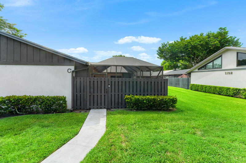 Enjoy the comfort and convenience of single-story villa living in this beautifully maintained 3-bedroom, 2-bath villa located in the highly desirable Summit Pines community. Unlike many townhomes and condominiums, this villa offers the convenience of no interior stairs, making everyday living easier and more accessible. This spacious villa features an open, airy floor plan with soaring vaulted ceilings and abundant natural light throughout. The kitchen offers generous cabinet space and an efficient layout that is perfect for everyday living and entertaining. The spacious primary suite includes a private en-suite bathroom and ample closet space. Relax on the peaceful screened-in patio, an ideal space for morning coffee, outdoor dining, or entertaining guests.  The home also includes two assigned parking spaces for added convenience. Summit Pines is a pet-friendly community with outstanding amenities, including a community pool, clubhouse, tennis courts, basketball court, playground, walking trails, on-site management, and ample guest parking. Ideally located near shopping, restaurants, schools, and major highways, this exceptional villa offers the perfect combination of comfort, convenience, and low-maintenance living. Don't miss this opportunity to own a spacious, move-in-ready, single-story villa in one of West Palm Beach's most desirable communities!