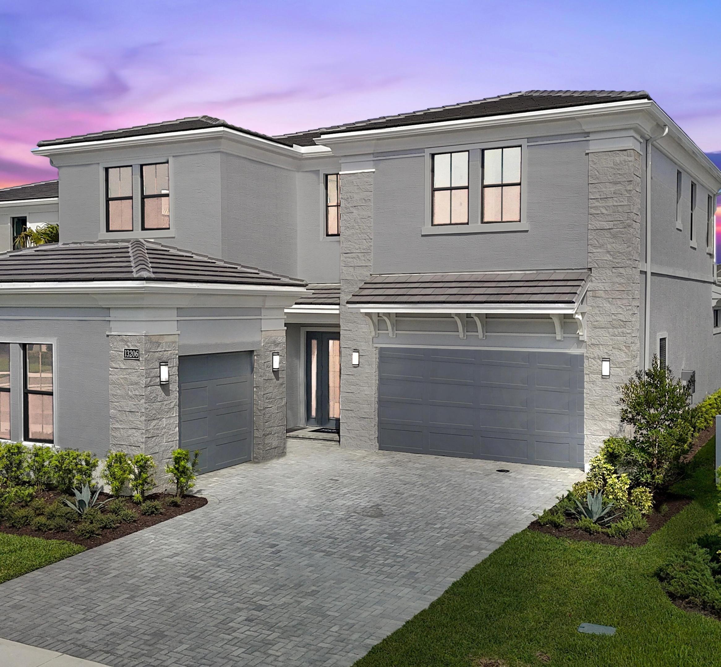 Experience the epitome of modern luxury living!!! This meticulously designed New Construction residence boasts a spacious gourmet kitchen with GE Monogram appliances, 42'' refrigerator, gas cooktop, 3'' Cambria quartz countertops, double wall ovens, beverage cooler, mini refrigerator, and more! The owner's suite is located on the first floor which offers coffered ceiling, soaker tub, oversized shower and large walk-in closet with built in's! This residence additionally features gorgeous RevWood floors throughout the entire living space, wood staircase, abundance of natural light with first floor laundry room. The second floor showcases the oversized loft with modern snack bar/wet bar area and 3 additional ensuite bedrooms! Features an outdoor kitchen area ready for entertaining. Great   water view with ample space for a pool! The upscale community of Artistry is gated with armed security, clubhouse with fitness center and event space, luxurious pool, walking trails, playground and sport courts.((Prime location by I-95, Alton Town Center, The Gardens Mall, Lifetime Fitness, local beaches with PBI airport being just 20 minutes away. Don't miss out on this rare opportunity to live in luxury in the heart of Palm Beach Gardens.
