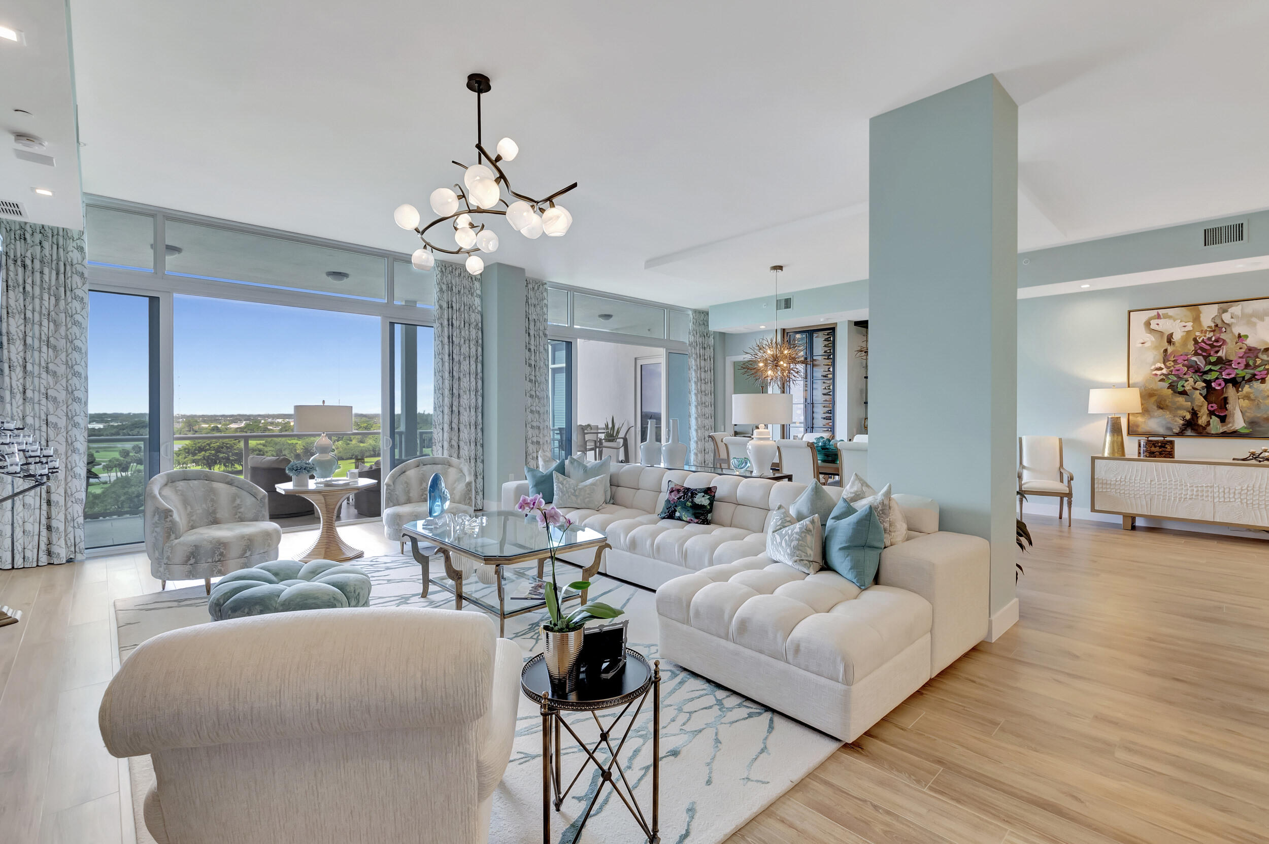 ONE OF A KIND TOTALLY CUSTOM MAGNIFICENT AKOYA PENTHOUSE  WITH FABULOUS GOLF & LAKE VIEWS! PURE LUXURY EXUDES FROM EVERY INCH OF THIS EXQUISITE HOME!  SOARING 11'6'' CEILINGS WITH FLOOR TO CEILING WINDOWS IN EVERY ROOM! 33' & 25' BALCONIES FLANK THIS SUN FILLED PARADISE! 3 BED/3.5 BATH, 4 GARAGE SPACES 2 WITH ELECTRIC, PRIVATE ELEVATOR ENTRY, GOURMET CHEF'S KITCHEN, STUNNING PRIMARY SUITE WITH EXPANSIVE HIS & HER CLOSETS, LUXURIOUS PRIMARY BATHROOM WITH HIS & HER WATER CLOSETS & FLOATING TUB! CUSTOM CABINETRY THROUGHOUT, CRESTRON SMART HOME, ELECTRIC SHADES, CAPTIVATING 80'' FIREPLACE! AKOYA OFFERS VALET PARKING, 24 HOUR FRONT DESK ATTENDANT, RESORT STYLE SWIMMING POOL, FITNESS CENTER, SOCIAL PARTY ROOM, CARD ROOM & MORE! Boca West is the #1 Private Residential Country Club in the Nation Boca West is rated the #1 Country Club in the Nation!  Boca West offers over 400,000sf of amenity space, including an award winning spa, state of the art aquatics/fitness center, 10 restaurants, four 18-hole Championship Golf Courses designed by Arnold Palmer, Jim Fazio & Pete Due, 27 court USTA tennis facility, 14 pickle ball courts and every activity imaginable!!