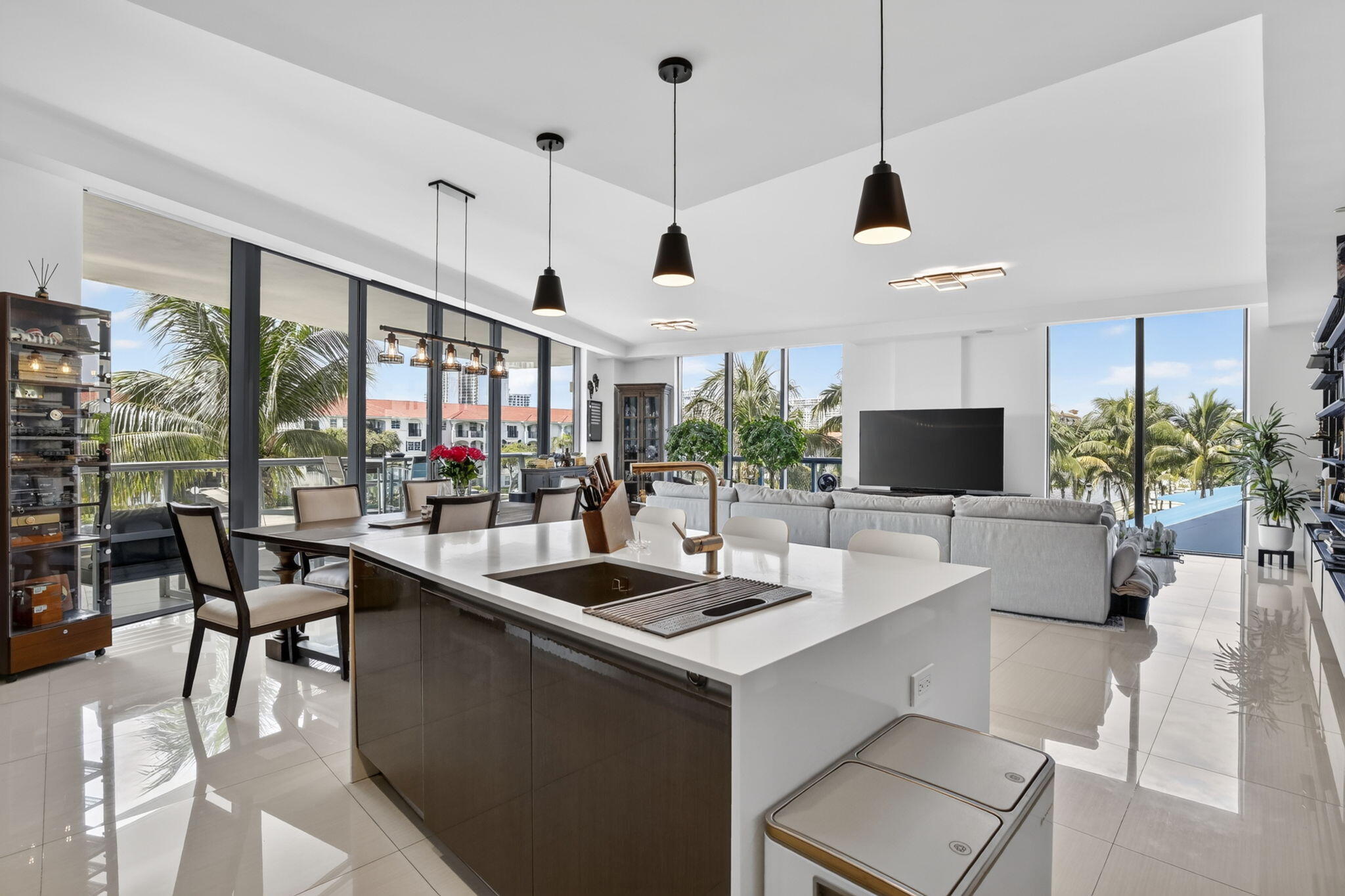 Luxury Waterfront Living at Its Finest! Welcome to this breathtaking corner unit offering sweeping panoramic views of the canal from every angle. Bathed in natural light through floor-to-ceiling windows throughout, this exceptional residence seamlessly blends sophisticated design with state-of-the-art technology — creating a truly elevated living experience. Two expansive L-shape balconies invite you to take in the spectacular waterfront scenery, while the finest finishes and appliances await inside.