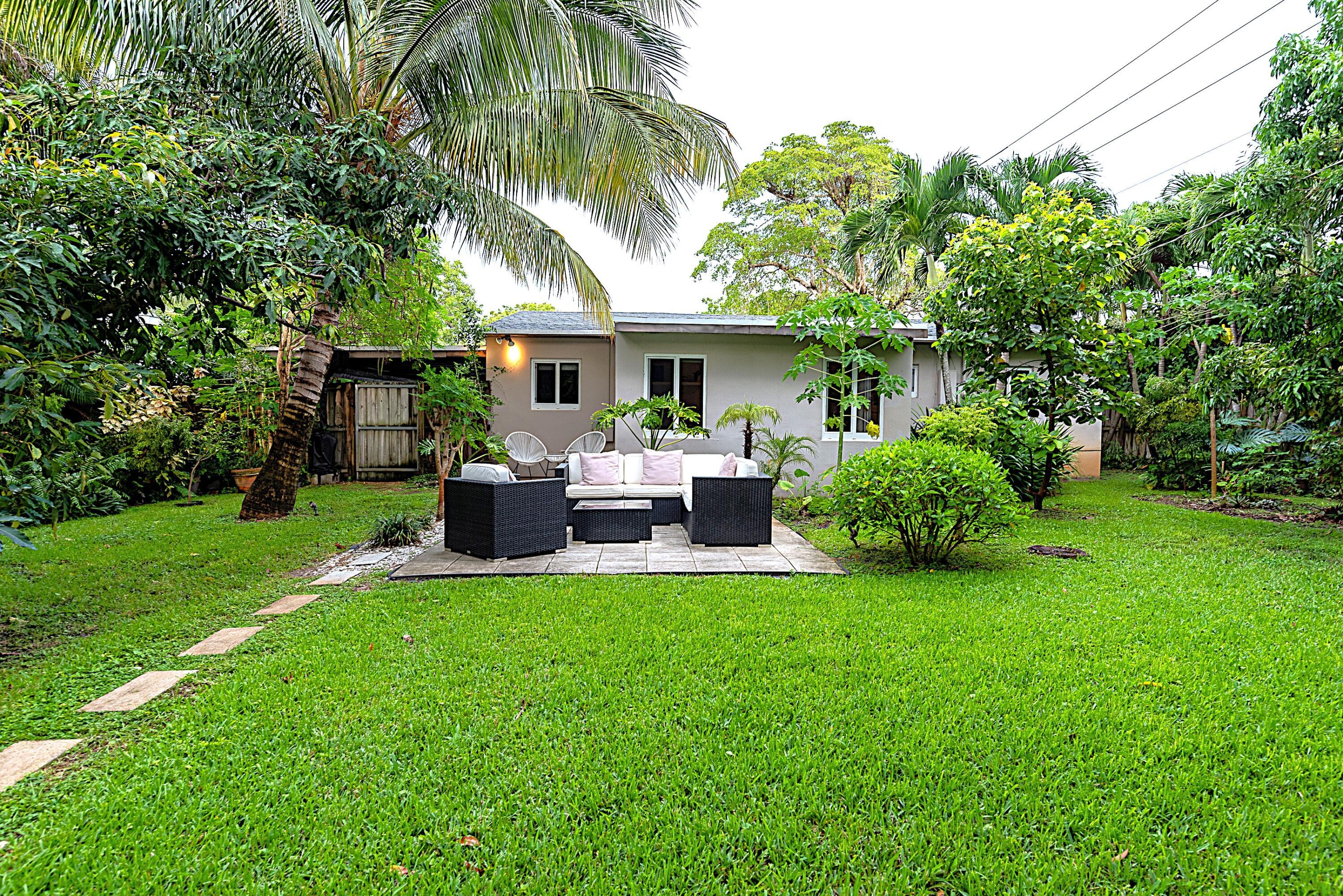TOP LOCATION, TOP NEIGHBORHOOD, QUAINT SPOTLESS HOME. HUGE BEAUTIFUL TROPICAL OASIS BACKYARD WITH DIFFERENT FRUIT TREES. HOME HAS A GREAT LAYOUT WITH PRIMARY BEDROOM SEPARATE FROM OTHER 2 BEDROOMS. THIS IS A REAL 3/2PLUS A DEN OR OFFICE. ALL IMPACT WINDOWS AND NEW ROOF. PRIDE OF OWNERSHIP. XL CORNER LOT. GREAT HOME FOR OUTDOORLIVING. VERY PRIVATE. LARGE CARPORT. 2.5 MILES FROM THE BEACH, DOWNTOWN FORT LAUDERDALE LAS OLAS AND WILTON MANORS.
