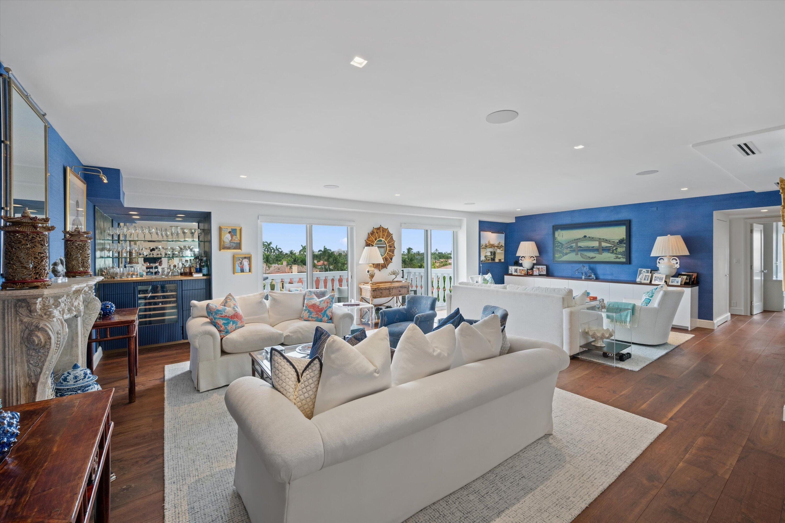 Ideally located just a short stroll from Worth Avenue's renowned shopping and dining, this exquisite three-bedroom residence is situated in one of Palm Beach's most sought-after buildings. This spacious, unit features beautiful hardwood floors, elegant crown moldings, and an inviting layout enhanced by abundant natural light. The residence enjoys charming downtown views framed by lush palm trees. The updated kitchen and bathrooms showcase tasteful finishes. The property also includes covered parking for added convenience. Available as a furnished seasonal rental at $27,500/mo.
