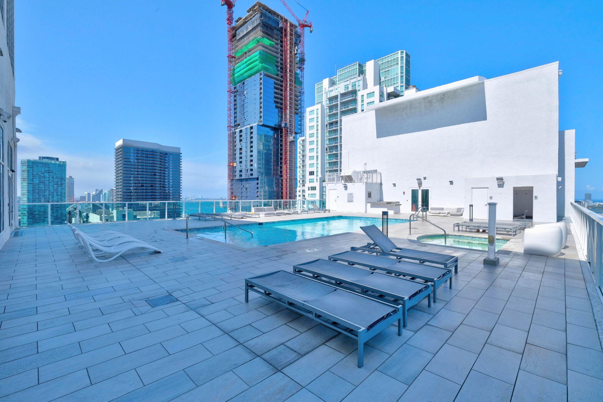 Welcome to this modern and spacious loft right in the heart of downtown Miami. At  over 900 square feet, this is the largest one-bedroom layout in the building. The loft-style design features high ceilings and polished concrete floors that perfectly frame those incredible Miami skyline views. The kitchen is beautifully finished with Italian white cabinets, granite countertops, and stainless steel appliances. For your peace of mind, the seller is currently installing a brand new water heater. You will also appreciate the generous storage space in the large walk-in closet. The building offers fantastic amenities designed for a comfortable lifestyle. Enjoy the newly renovated rooftop swimming pool, relax in the jacuzzi, or get some exercise in the lap pools by the gazebo.