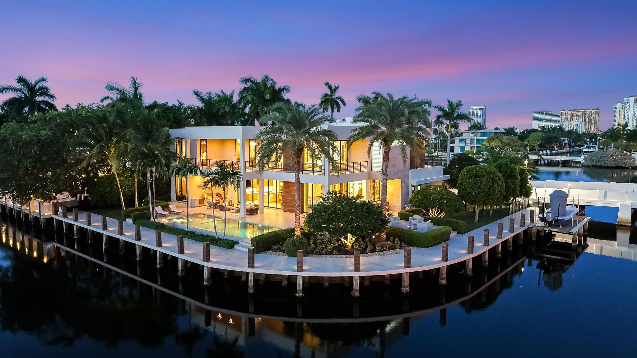 Prominent Las Olas peninsular. Custom point Estate with 362 ft deep water & stunning views from EVERY room! Offered fully furnished, design by D Deperro Design. Curated for an avid boater & entertainer. House walled & gated. Highest quality construction & custom finishes throughout. Crestron technology, security & generator. Dramatic entry & staircase. Rooms flow seamlessly, great room, bar, fireplace, ultimate Chef's kitchen, dining island & professional grade appliances, sliding glass doors pocket to pool area. Formal dining room & fireplace. Office, media room/VIP bedroom suite. Elevator. Exquisite large primary:separate spa style baths,2 custom closets (15x19 dressing room). Gym plus 2 large bedroom suites. Great water facing balcony. Fully equipped docks. 4 bay air conditioned garages Architect: Gregory AndersonBuilder: Joe DiMauro, JSD Builders362 ft of deepwater No Profile Boat Lift capacity 50,000 lbs & South Boat Lift 10,000 lbsSuspended staircase with cable designExtensive custom cabinetry & wood paneling throughoutFully equipped bar with pass-through to outside area, under-lit onyx counters, ice-maker, temperature controlled wine cellar for 200+ bottlesGreat room with pocket doors that slide into the wall on the entire corner for seamless indoor-outdoor entertainingOnyx clad fireplaceCuisine Ideale kitchen cabinetry, Sub-Zero & Wolf Appliances, Italian mosaic backsplash, three sided casual dining island seating for 6, walk-in pantry, ample storage & countersOpen formal dining room with fireplace & seating for 12Dedicated home office with custom cabinetry, desk area & closetFirst level media room or VIP suite with spa style bath & custom closets (currently used as Media Room)Double sided elevatorSecond level gym open to the gallery hallway with custom wall panels & lightingStunning & expansive primary suite with seating area, separate spa baths & custom closets, the second closet/dressing room is 15x19.  Both baths have custom spa inspired amenities.  Custom drapery, shades & lighting.  Primary suite opens to a large balcony with amazing views.Two additional & large bedroom suites both with upgraded spa baths, separate showers & soaking tubs.Custom lighting & drapery throughout.SOLD FURNISHED WITH SOME EXCLUSIONS - Inventory to be provided.EVERY SINGLE ROOM OFFERS A WATERFRONT VIEW!Main house dock:Ped 1 has 30A/30A/20APed 2 has 30A/30A/20a plus 20A to liftEast dock:Ped 1 has 30A/30A/20A plus 60A lift4 AC’s plus 2 split systems for garagesPool chiller and pool heaterGenerator