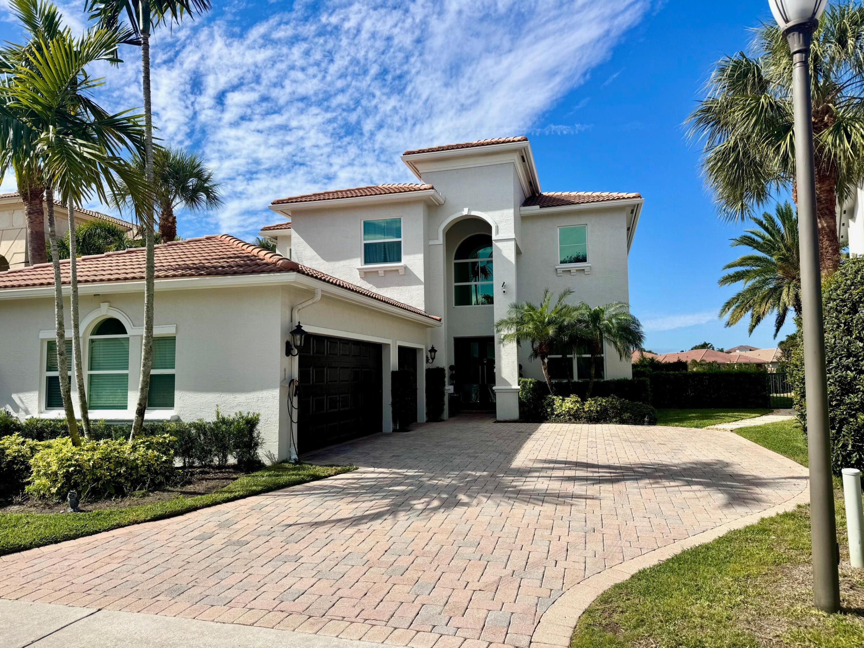 This 3,000 sq. ft.,5 Bedroom (4 BR's + Den) Home is situated on a premium Lakefront, pie-shaped lot on a cul-de-sac street in the highly sought-after community of Mirabella. This home features a Heated Pool and an upgraded Travertine Tile Patio & Pool Deck with fenced-in back & side yards. Also features a large, covered lanai. Many interior upgrades include Brand new high-end vinyl flooring in all Bedrooms, Stairs & Hallway upstairs, just repainted interior, an upgraded Kitchen with stainless steel appliances, a remodeled Master Bathroom, and an Updated Full Bath on the first floor. Spacious Master Bedroom has Large Walk-in Closets with Custom Built-ins & 3 other spacious Bedrooms Upstairs. There's also a 3-car garage and Full Impact Glass Hurricane Windows and Doors Throughout.