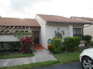 RARE FIND! CORNER VILLA WITH ADDED SQUARE LIVING. IT IS A 2/2 BUT THE 3RD BEDROOM AREA IS OPEN FOR ADDED SOCIAL SQUARE FOOTAGE (COULD BE CONVERTED TO 3 BR). UNIT WAS REMODELED WITH NEW KITCHEN CABINETRY, UPGRADED WHIRPOOL STAINLESS STEEL APPLIANCE PACKAGE (1 YR NEW), GRANITE COUNTER TOPS AND A DEDICATED BREAKFAST AREA. NEW PORCELAIN TILES THROUGHOUT AND LAMINATE WOOD IN BEDROOMS (INCLUDING EXTRA LIVING AREA) MASTER BATH VANITY REMODELED WITH GRANITE COUNTER TOPS ALSO. LARGE WALKING CLOSET IN MASTER BEDROOM. THIS VILLA HAS AMAZING STORAGE SPACE INCLUDING A LARGE DOUBLE DOOR MIRRORED CLOSET IN DINING AREA. THE OUTDOORS OFFERS A TILED LANAI WITH NICE GARDEN VIEW AND PARTIAL LAKE VIEW. WILLOW BEND OFFERS TWO POOLS AND IT IS A WELL LOCATED COMMUNITY.