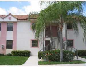 RECENTLY COMPLETELY RENOVATED & UPDATED 2/2 WITH LAKE VIEW. BEAUTIFUL NEWER GRANITE KITCHEN W/STAINLESS APPLIANCES & WHITE EUROPEAN STYLE CABINETS WITH SELF CLOSING DRAWERS. SMOOTH FINISH CEILINGS WITH LED RECESSED LIGHTING THROUGHOUT EVEN IN THE BEDROOMS. BOTH BATHROOMS FEATURE MARBLE FLOORS W/BRAND NEW SHOWER & BRAND NEW TUB W/FLOOR TO CEILING DESIGNER TILE ENCLOSURES. THIS END UNIT FEATURES SOARING CEILINGS NEW LUXURY VINYL FLOORING IN BEDROOMS. AND EXTRA WINDOWS MAKING IT LIGHT & BRIGHT. SCREENED PATIO OVERLOOKS LAKE. CONVENIENTLY LOCATED ACROSS FROM AMENITIES & POOL. CLOSE TO EVERYTHING & GUARD GATED 24/7. LOOK AT THE REST & LIVE THE BEST