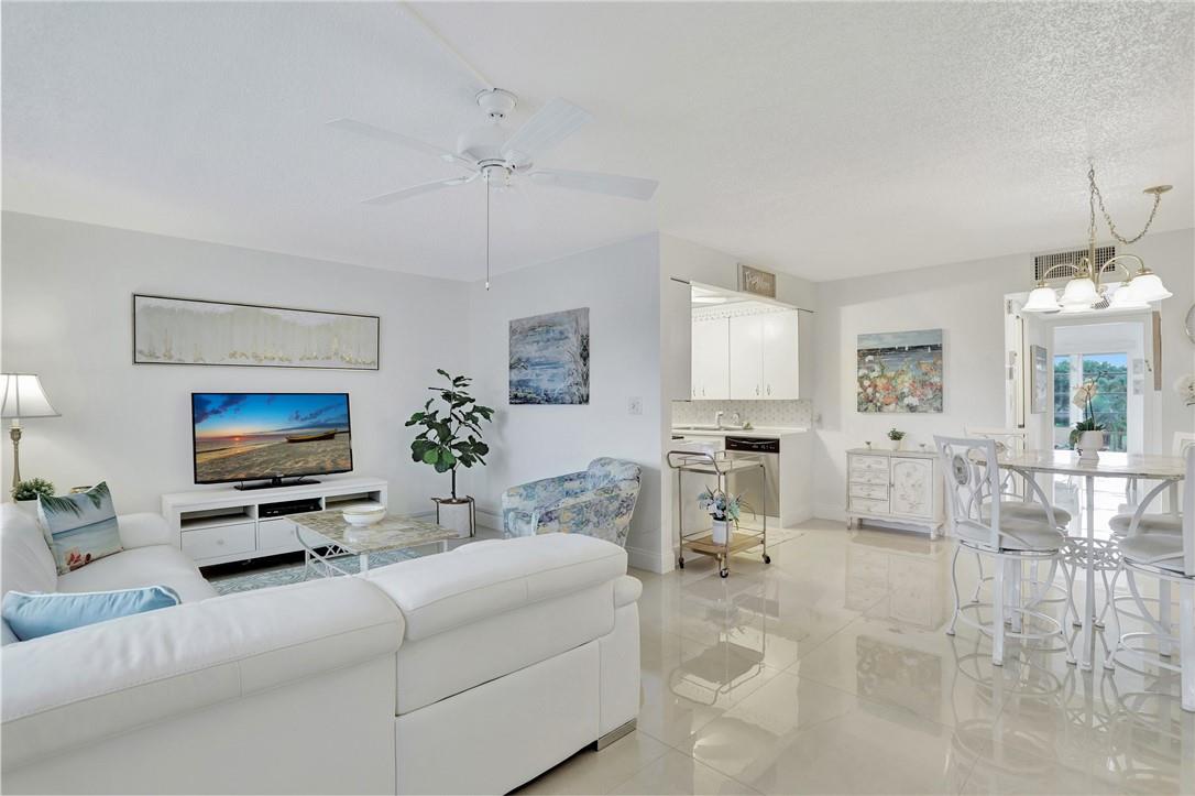 Must see to believe, Florida living at its best! Gorgeous golf and water views from your private enclosed tropical patio, this 1br/1.5 bathroom condo has been tastefully furnished and decorated with relaxation and tranquility in mind. Turnkey furnished ready. Impeccably clean throughout. Community features 24/7 patrol gated community, 18-hole golf course, clubhouse, restaurant, tennis/pickleball, theater for shows/movies, fitness center, Zumba classes, billiards center, 18 heated pools, hot spa, resistance walking pool, barbecue stations, shuttle bus to shopping centers. Rent includes Basic cable with HBO and water, and storage cage. New elevator was just installed. There are over 80 different clubs to meet new friends and enjoy life in the tropical paradise of Wynmoor!