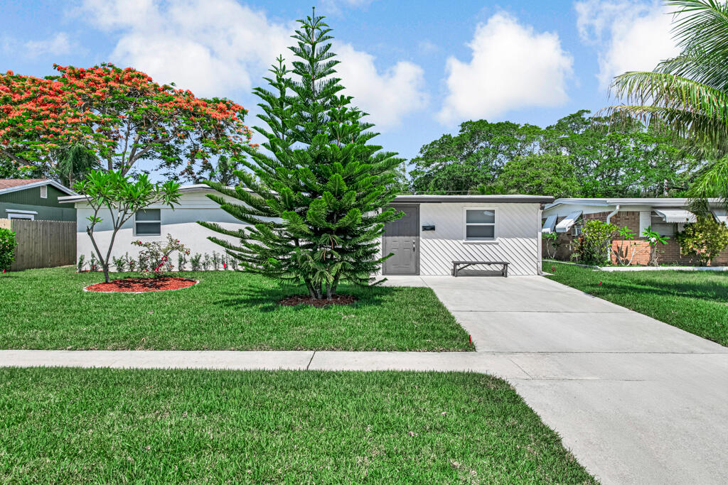 Welcome to this charming 4-bedroom, 2-bathroom single-story residence located in Palm Beach Cabana Colony 1. Offering 1,582 square feet of finished living space, this waterfront property provides a wonderful opportunity to enjoy coastal living in Cabana Colony. The thoughtful floor plan accommodates multiple bedrooms and bathrooms, making efficient use of the available space. As a waterfront residence, this home captures the appeal of the brand-new pavers/grass all fenced around patio, Modified bitumen roofs are strong, durable, and can last for 20 years or longer with proper maintenance