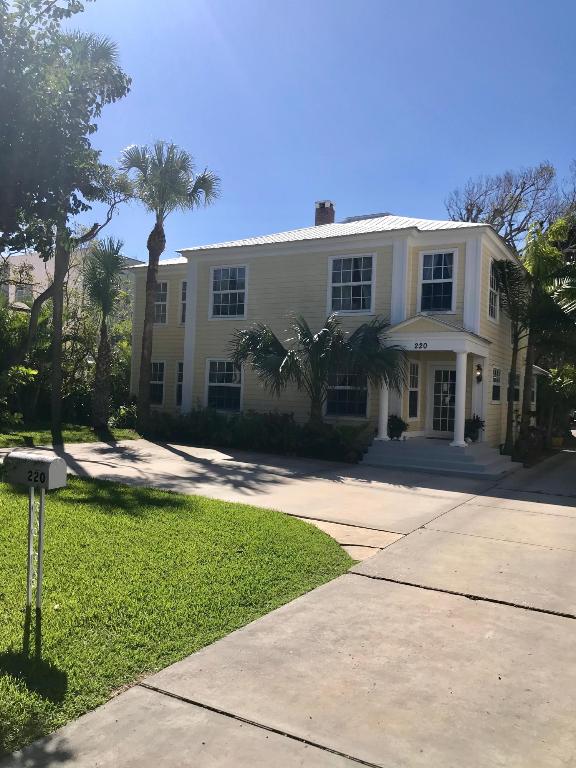 Palm Beach Island In-Town 1925 4/2.5 Beach Cottage.  Hardwood floors throughout.  All impact doors and windows.  Large lot (100x171) with RC zoning that offers fantastic town house development opportunities.  Priced below appraised value.  Commercial building next door available separately as well.  Unlimited possibilities