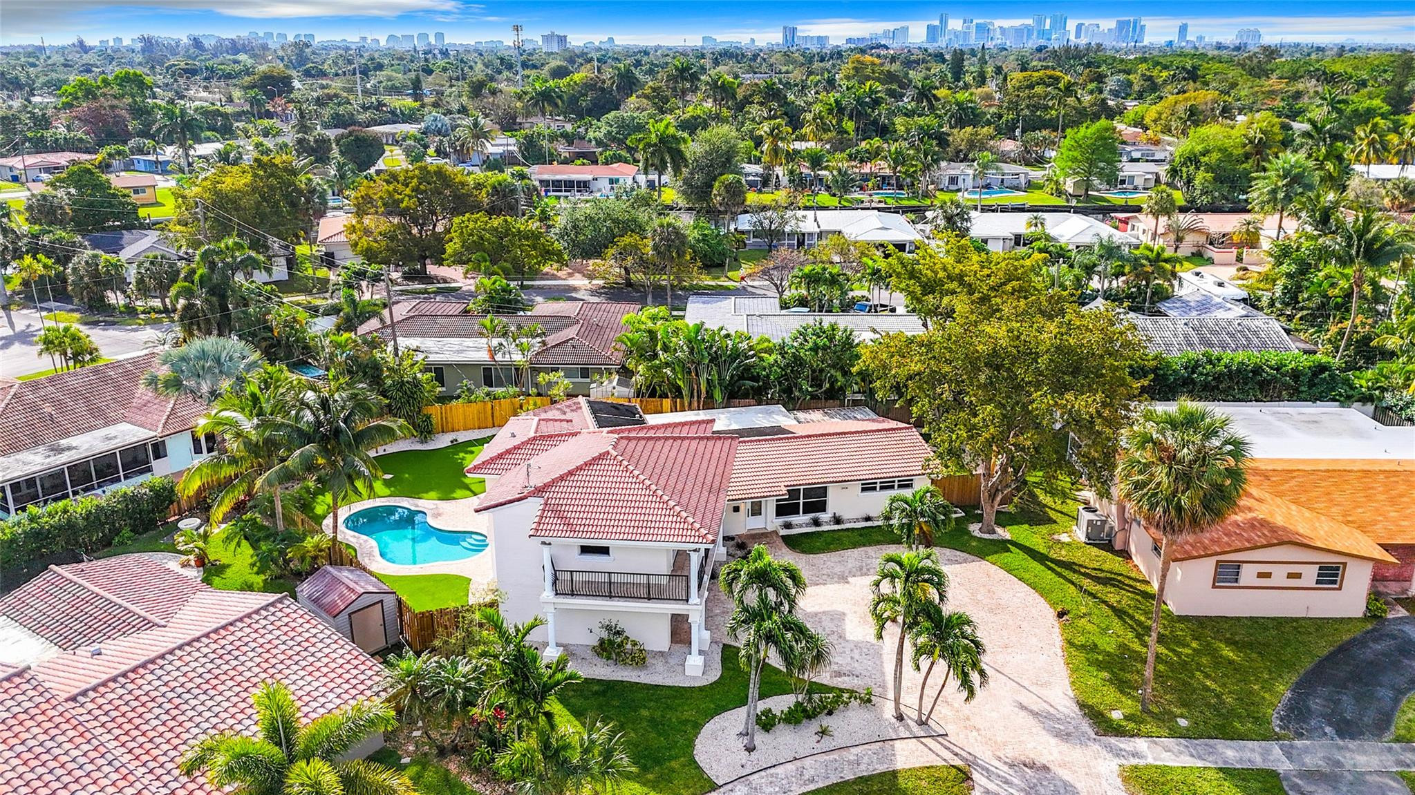 Discover this beautifully renovated gem in the sought-after community of Jenada Isles, Wilton Manors. This stunning home features 4 bedrooms, 3 baths, a sparkling pool, and a spacious 2-car garage. Enjoy the elegance of brand-new appliances, modern quartz countertops, and a thoughtfully designed layout. The main floor offers 3 bedrooms and 2 baths on one side, while a private suite with its own entrance, balcony, and en-suite bath sits above the garage. Nestled on a generous corner lot, this home is conveniently located near Wilton Drive, Downtown Fort Lauderdale, and beautiful beaches. Whether you're looking for a primary residence or a fantastic Airbnb opportunity, this property is a rare find that combines style, comfort, and prime location.