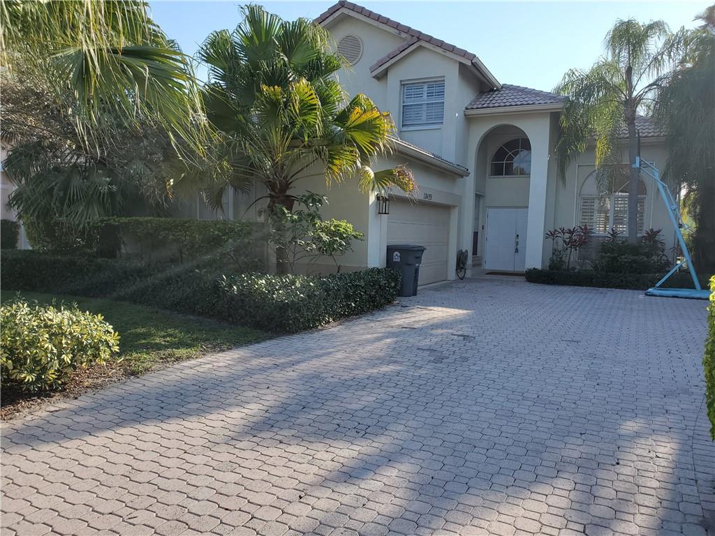 Amazing 4/3 POOL home just needs some TLC! Unfortunate circumstances left this home in need of some updating. Price has been drastically REDUCED, and is now available for its next owner to make their own. This home is bright and open and brings lots of space and room for whatever is needed. Eat-in kitchen over-looking family room and entire pool/spa area, 2 separate living areas downstairs and 1 bed/1 bath to relax and enjoy in for a big family, large volume 20ft ceilings. Upstairs master suite and 2 additional bedrooms. 5 ton A/C only 4 years old and Hurricane panels. No Golf Membership. Family Community & A+ rated schools, Junior Olympic size Pool, Kiddie pool/playground, Pavilion, Fitness center, Soccer, BBQ grills, Basketball. Original Roof, will agree to give some credit at closing.