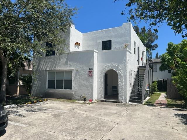 Discover this two-story quadruplex located in Lake Worth Beach, offering 3,500 square feet of finished living space. Has separate house in back which could be owner occupied. Nicely maintained units and great cash flow for investors! All units have been redone in the last two years. 7 off street parking spaces. Laundry facility. Current rents of $80,000/yr. Quiet residential neighborhood. Each unit has own water heater. Most HVAC units less than 3 years old. Unit 2 has own private balcony. Unit 3 is a one bedroom and one bath unit at 630sf. It is rented for $1500/mth. Unit 4 is a two bedroom and two bath house rented for $1900/mth