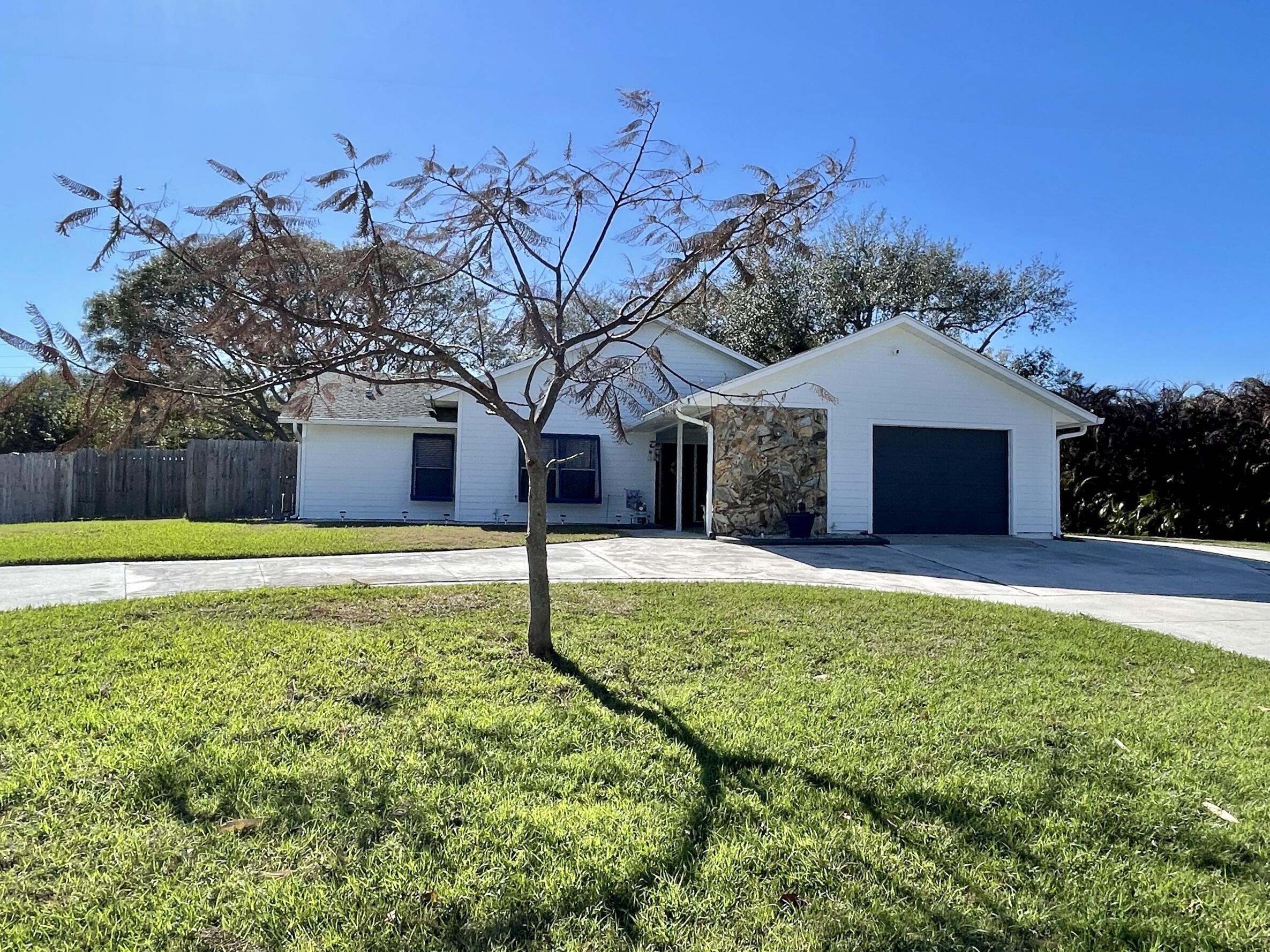 Located in River Woods Subdivision in St. Lucie Village, Florida. The home offers 1,709 square feet with 3 bedrooms, 2 baths, and a pool with spa sitting on a half-acre fenced lot. The property also features a community dock on the Indian River that can be utilized for fishing, launching kayaks, or just watching the sunrise. Available immediately.