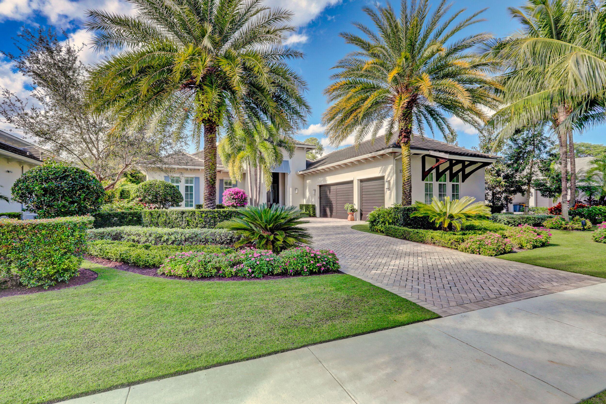 Perfection in paradise! Do not miss this rare opportunity to purchase an exquisitely appointed single-story family home in the highly desirable Isles Estates of Old Palm. This contemporary residence features a total of 5,491 square feet and was built in 2015 by the well-known custom builder Paul Courchene. Nestled on the tenth hole the dwelling is the preferred Coquina model and the tranquil street featuring lush landscaping and panoramic sunrises.
 
This professionally decorated property features 4 bedrooms, a den, 5 full baths, 2 half baths, and a 3-car garage. Clean lines dominate the interior design and there are abundant upgrades throughout the home. crown molding, custom, hardware, lighting and window treatments, hurricane impact window and doors. Enhanced systems include a Culligan water filtration, water shut-off, central vacuum, state of the art Sonos audio equipment, and an all-house generator. 
 
The gourmet kitchen features a top-of-the-line Thermador 6 burner gas stove, high-end appliances, and a butler's pantry. A wet bar is located between the living room and sizable dining room. Triple sliding glass doors lead to a serene private pool area with patio. This expansive outdoor area features a summer kitchen, a fireplace, a spa and inviting covered area with a pecky cypress ceiling and phantom screens. The exquisite master bedroom ensuite includes beamed ceilings, stylish his and her bathrooms, and well-designed his and her walk-in closets. Furnishings are negotiable. 
 
This spectacular property is perfect for even the most discriminating buyer. It is not expected to last so please schedule your showing today.