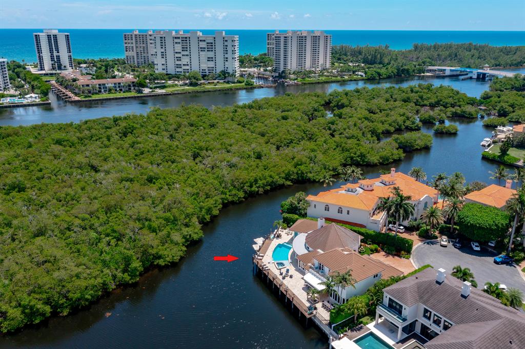 The Sanctuary's Finest Deepwater Property with 178 feet of Waterfront and Prime Yacht package for a 120 foot Plus, Plus Mega Yacht! This beautiful Deepwater Estate offers 5 bedrooms, 6 full, 3 half baths, 7,304 total square feet, with spectacular Intracoastal water views galore from all major rooms! First floor master suite, marbled bath, mahogany paneled office/library, resort-style pool and spa with wraparound loggia, summer kitchen, cabana. Complete Impact Windows and full House Generator.