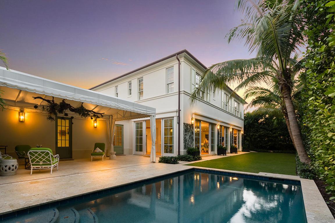 Just one block from both the Atlantic Ocean and the bike trail, this newly built Bermuda Colonial provides luxurious state-of-the-art features with the conveniences of in-town living. 
Conversation and company flow through the open floor plan which includes a great room (with dining, sitting, family areas) all open to chef’s kitchen, a master suite with dual sinks, a roman tub and separate shower in the grand bath as well as walk-in closets.  Walls of glass doors lead to the lushly landscaped back yard with pool and covered loggia for relaxing.  Two laundry rooms, a two-car garage, and full hurricane impact windows complete this home. Built by Benitz Construction in 2015, this stunning home includes many upgrades such as top-of-the-line appliances, hardwood and limestone flooring, and landscaping. Additionally, this is a low VOC home with the highest standard of air quality. 
Palm Beach Island is world-renowned for its extraordinary beauty, small-town character and luxurious lifestyle. Come experience it for yourself!