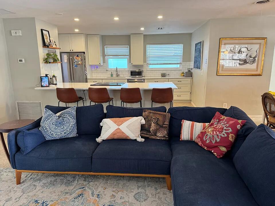 3 bedroom, 2 bath split floor plan in the heart of Jupiter in the Pines! Fenced in backyard with a shed, and plenty of space to store your kayaks and paddle boards. The spacious open floor plan, kitchen and Florida room, allow plenty of room to entertain. Pets are welcomed on a case by case basis. Walking distance to shops, beautiful sunset bridges, and the Loxahatchee River. You will love this quiet community minutes to the beach and restaurants.