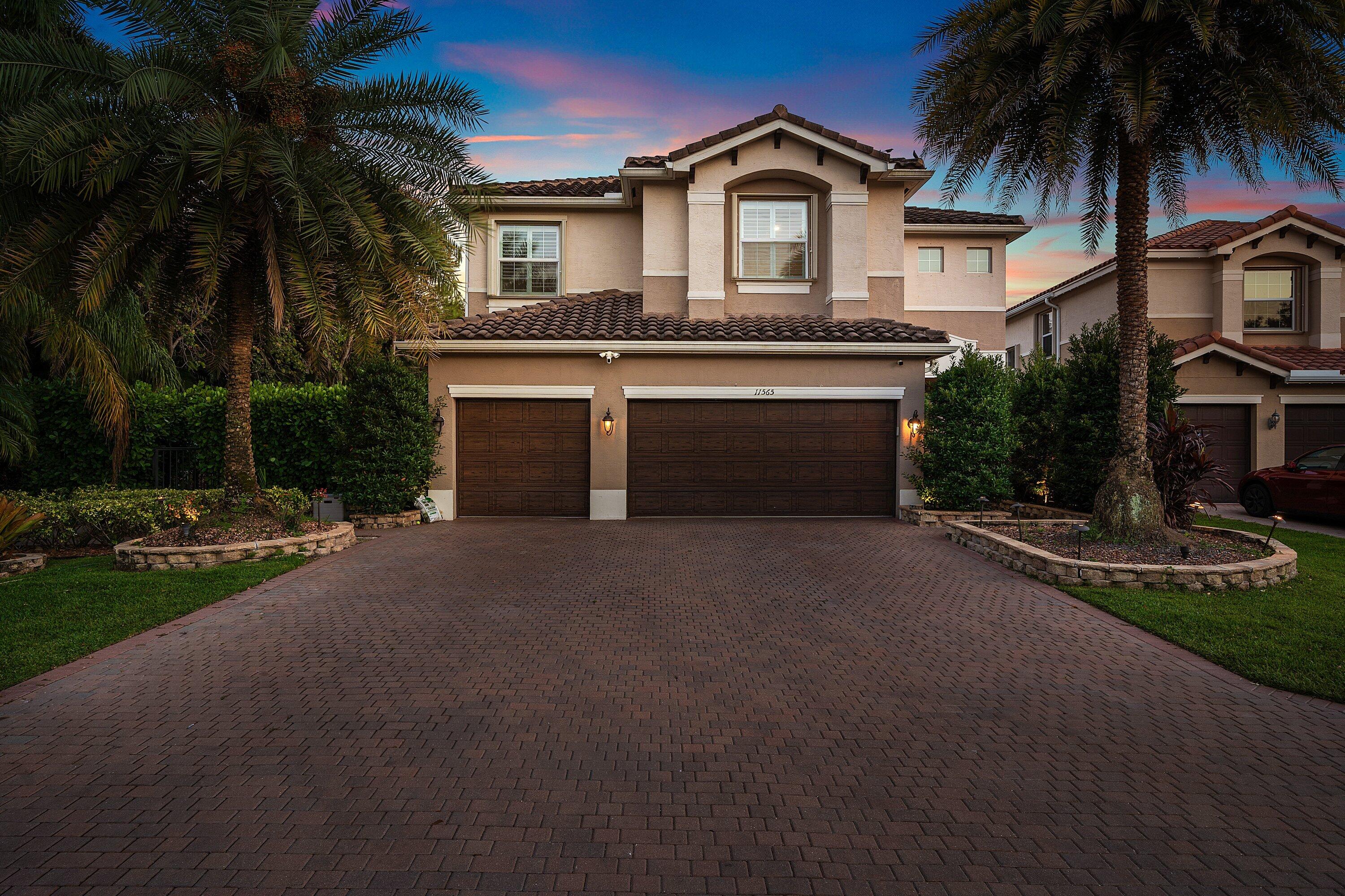 Rarely available and truly one-of-a-kind, this Canyon Trails estate has been reimagined for elevated indoor-outdoor living. Offering 6 bedrooms, 5 bathrooms, and a versatile loft, every space is designed with both function and lifestyle in mind.  The standout feature is an extraordinary custom outdoor expansion - almost never seen in the community. A massive covered lanai creates a fully realized outdoor living space, perfect for lounging, dining, and entertaining year-round. Above, an expansive extended deck offers a private retreat off the primary suite, complete with a retractable awning, ambient lighting, and a striking spiral staircase that seamlessly connects both levels and leads down to the pool. The outdoor experience continues with an impressive travertine patio extension, providing an abundance of additional space for hosting on any scale.  Inside, refined design elements add warmth and sophistication throughout, including custom stone accent walls and luxury wood ceiling details that elevate the home's overall aesthetic.  Thoughtful upgrades enhance flexibility and livability. The loft has been enclosed with tempered glass and functions as a sleek home gym but can easily convert to an additional bedroom. A first-floor bedroom has been redesigned as a soundproof office, with a full bathroom conveniently located just outside - ideal for remote work or guest use. The 3-car garage is fully customized with built-in cabinetry, finished flooring, and pre-wiring for TV and sound.  Located within Canyon Trails, residents enjoy top-tier amenities including a clubhouse, resort-style pool and hot tub, fitness center, tennis and basketball courts, game room, children's play area, and onsite management. All within walking distance to excellent schools, shopping, and a new county park and library.