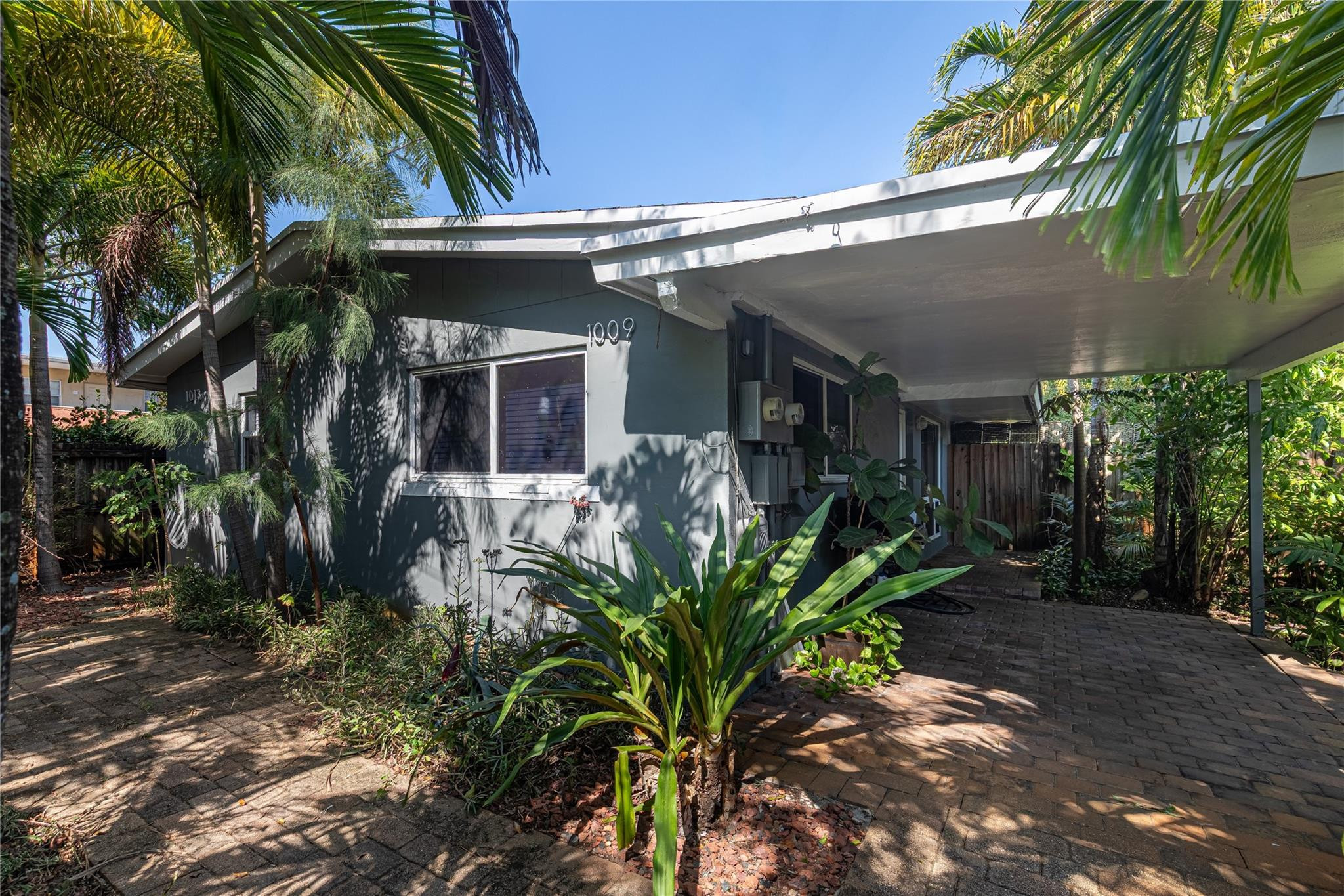 Newly priced and ready to sell - This duplex is just a  short distance from  Wilton Drive's restaurants and shops, as well as Fort Lauderdale Beach. Both units offer privacy and convenience, making this an attractive investment opportunity. Each unit features its own private stackable laundry, separate water & electric meters, and private fenced yards. Fully fenced property with 2 off-street parking spaces per unit. Currently rented with long-term tenants, providing immediate income. Both tenants wish to remain. Advance notice is required for showings. Interior photos are from 1013.  1009 is similar in layout/finishes with 1013 slightly larger in square footage.