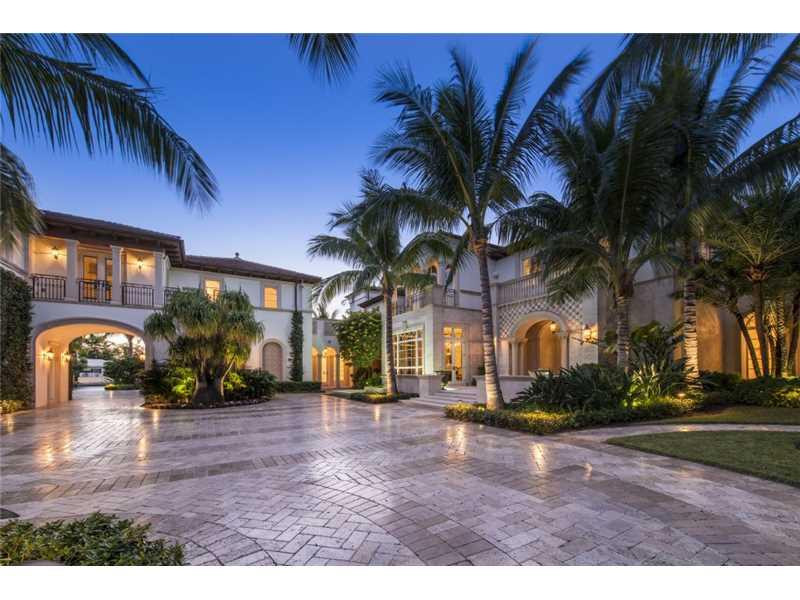 Gated Intracostal point lot in exclusive Harbor Beach. 400' deep water dockage in no wake zone. Exquisite estate boasting 7 bedrooms, including separate guest house/staff quarters. Separate boat garage & storage. State of the art home theater, amazing walk-in wine cellar, 2 offices, steam shower, sauna, spa, commercial level gym, elevator. Vast covered outdoor living/dining/kitchen w/fireplace & sliding glass that brings the outside in. Custom resort-style pool. Stunning views.