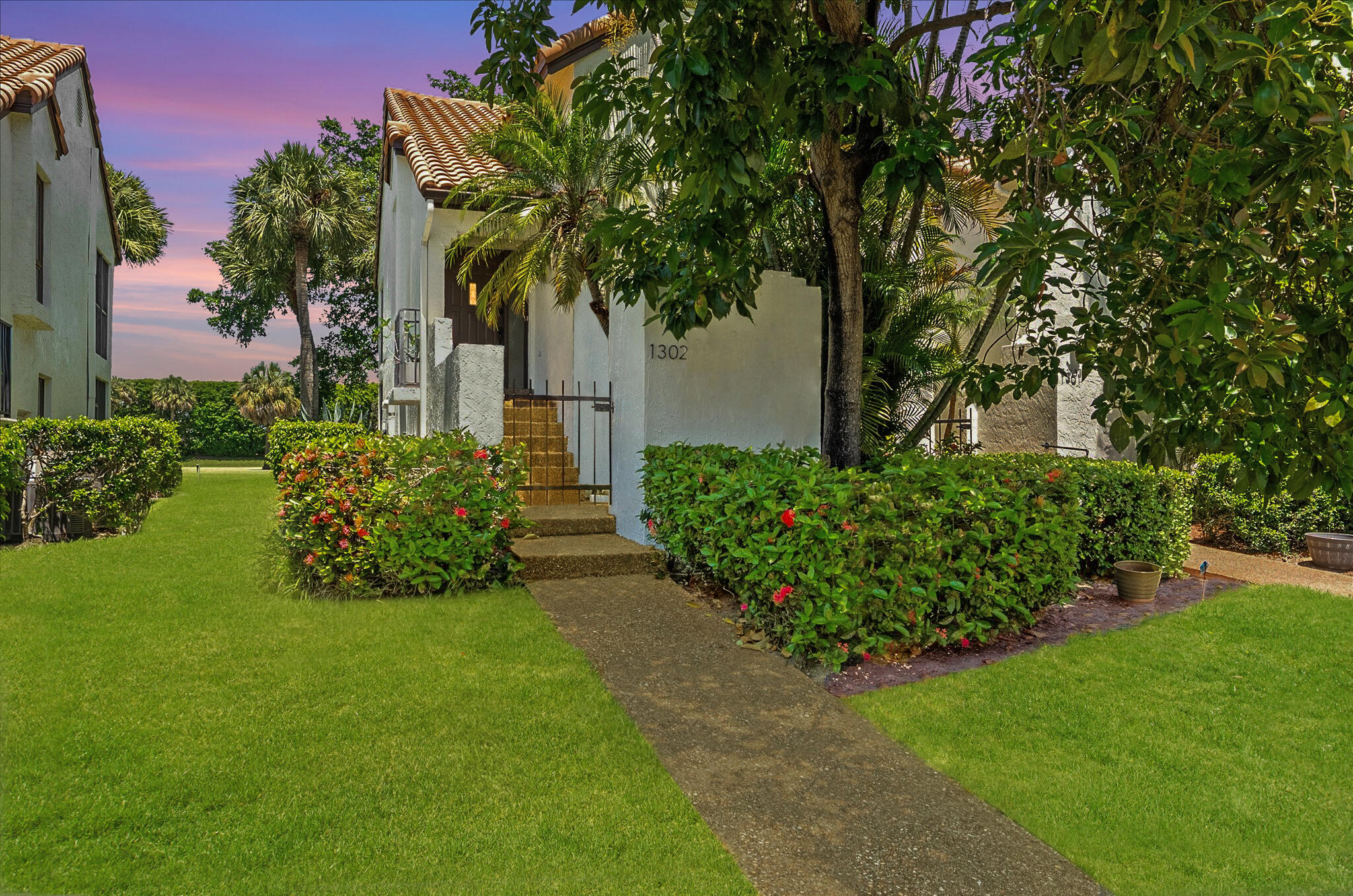 BEAUTIFUL END-UNIT CONDO | PEACEFUL GOLF VIEWS | IMPACT WINDOWS & SKYLIGHTS | STEPS FROM COMMUNITY POOL | Highly Desirable El Viento at Boca Pointe | Bright Open Floor Plan with Tons Of Natural Light | Vaulted Ceilings | Wet Bar | Kitchen with Stainless Appliances, Barstool Seating & Balcony | Screened & Glass Enclosed Lanai | Primary Bedroom with Sliders, Walk-In Closet & Ensuite Bath | Second Bedroom with Remodeled Ensuite | Laundry Inside | Amenities Include Pool, Tennis, Covered & Guest Parking | Pet Friendly | Prime Boca Raton Location, Minutes to Beaches, Boca Town Center, Mizner Park, FAU | Includes Cable, Landscaping & Pest Control | AC 2011 | WH 2016
