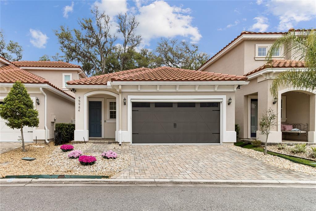 Immaculately kept and fully furnished, this turnkey single-story home features the highly sought-after Cindi floor plan and is perfectly positioned between the The Ritz-Carlton, Amelia Island and Omni Amelia Island Resort, just moments from the ocean, fine dining, and casual island eateries. This 2BR/2BA home offers 1,360 sq ft of modern coastal living with high ceilings, ample storage, luxury vinyl plank flooring throughout, quartz countertop and an open-concept layout designed for easy living and entertaining. The spacious gourmet kitchen features stainless steel appliances, a center island, and a 5-ring gas stovetop with a bright, airy flow into the main living areas. Relax on the private screened porch or enjoy the nearby community pool within this premier gated community.  Audio and Visual present. Inside cameras do not convey.