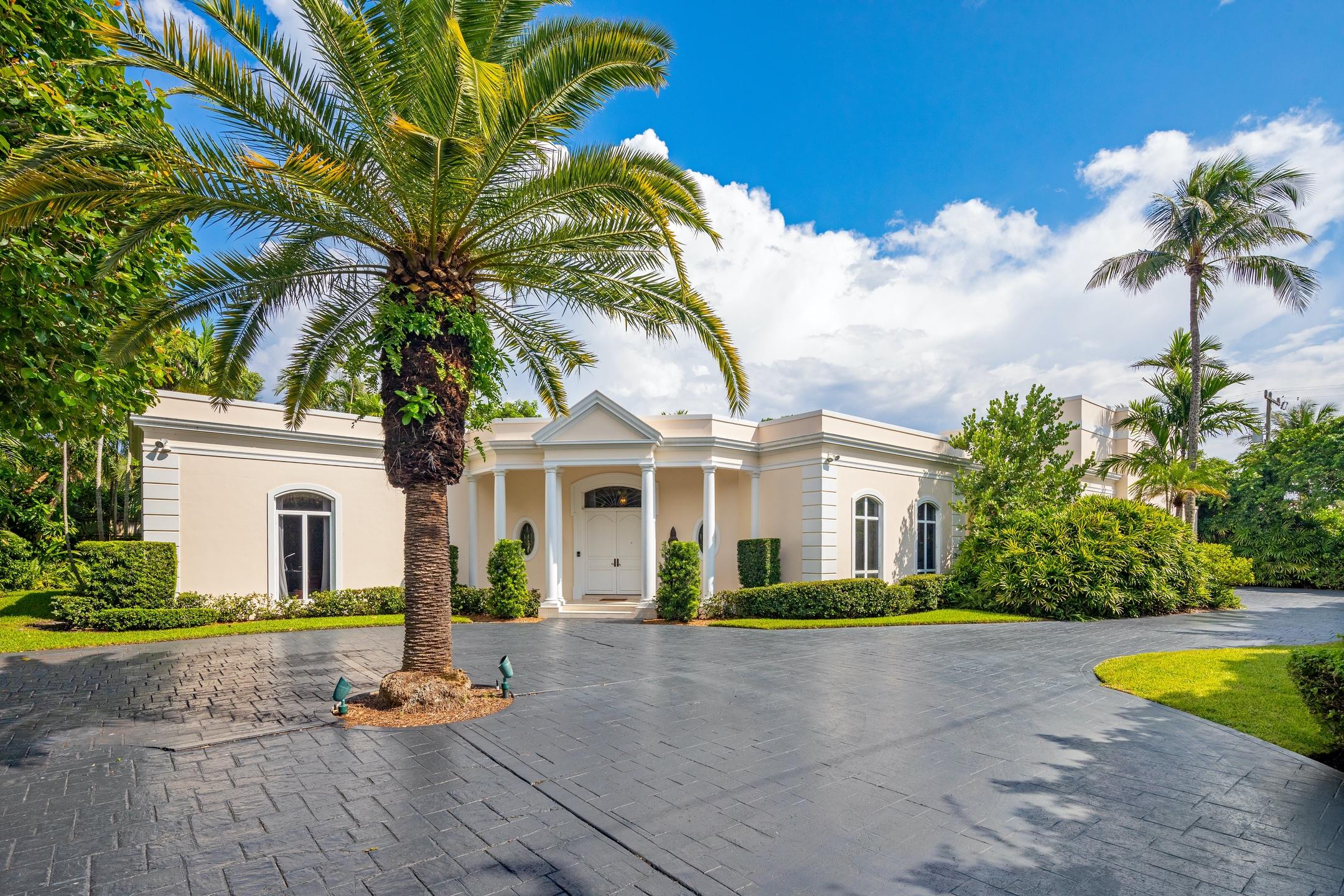 Quintessential Regency home nestled on a 26,000 sqft lot in the heart of the Estate Section. Built by renowned developer Robert Gottfried, this home features soaring ceilings and large entertaining spaces that effortlessly flow out to the garden and a classic Clarence Mack swimming pool. The owner's wing, comprised of a large bedroom with a private terrace, dual bathrooms & dressing rooms, and a library, encompasses the entire northern portion of the home, allowing for the utmost privacy and comfort. The original Clarence Mack pool house, with all of its classical Palm Beach glamour, has been incorporated into the main residence. Upstairs you will find 3 guest bedrooms, all with private en-suite bathrooms. Perfect opportunity to restore this magnificent property or build your dream home.
