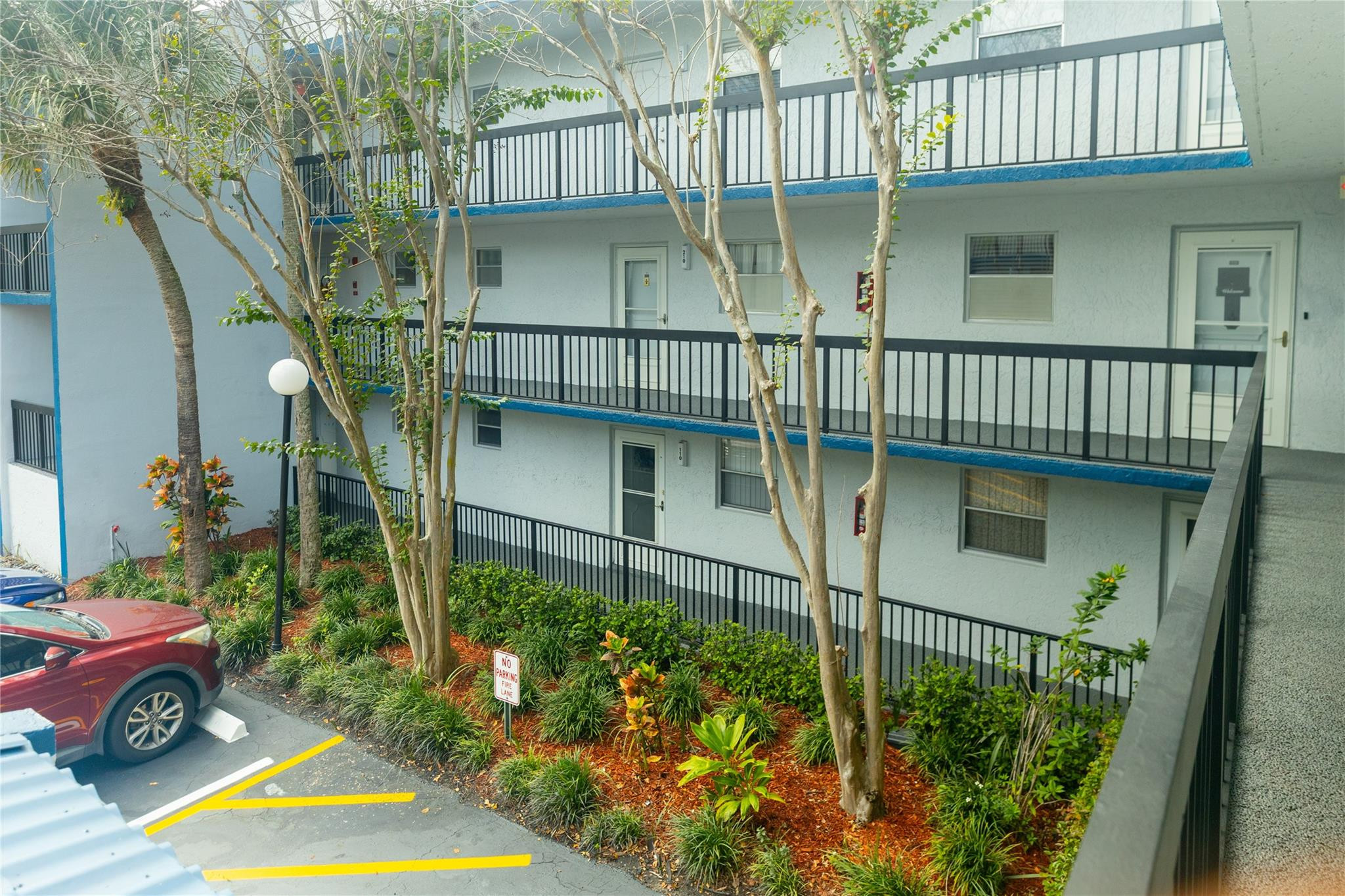 Move-in ready and thoughtfully updated, this beautiful 2nd-floor 1-bedroom condo with a convertible room and 1.5 baths is located in the desirable Holiday Springs community. This spacious unit features an enclosed patio that can serve as a 2nd sleeping area, home office, or flex space. Recent upgrades include brand-new porcelain tile flooring, a refreshed kitchen, and fresh interior paint. The primary bedroom offers 3 closets for abundant storage. Enjoy the convenience of being steps from the elevator, washer/dryer, and garbage chute. Assigned parking included. Community amenities feature tennis courts, a resort-style pool, and a beautifully maintained clubhouse. Ideally located just one light from Coral Springs and minutes from shopping, grocery stores, diverse dining options, and more!