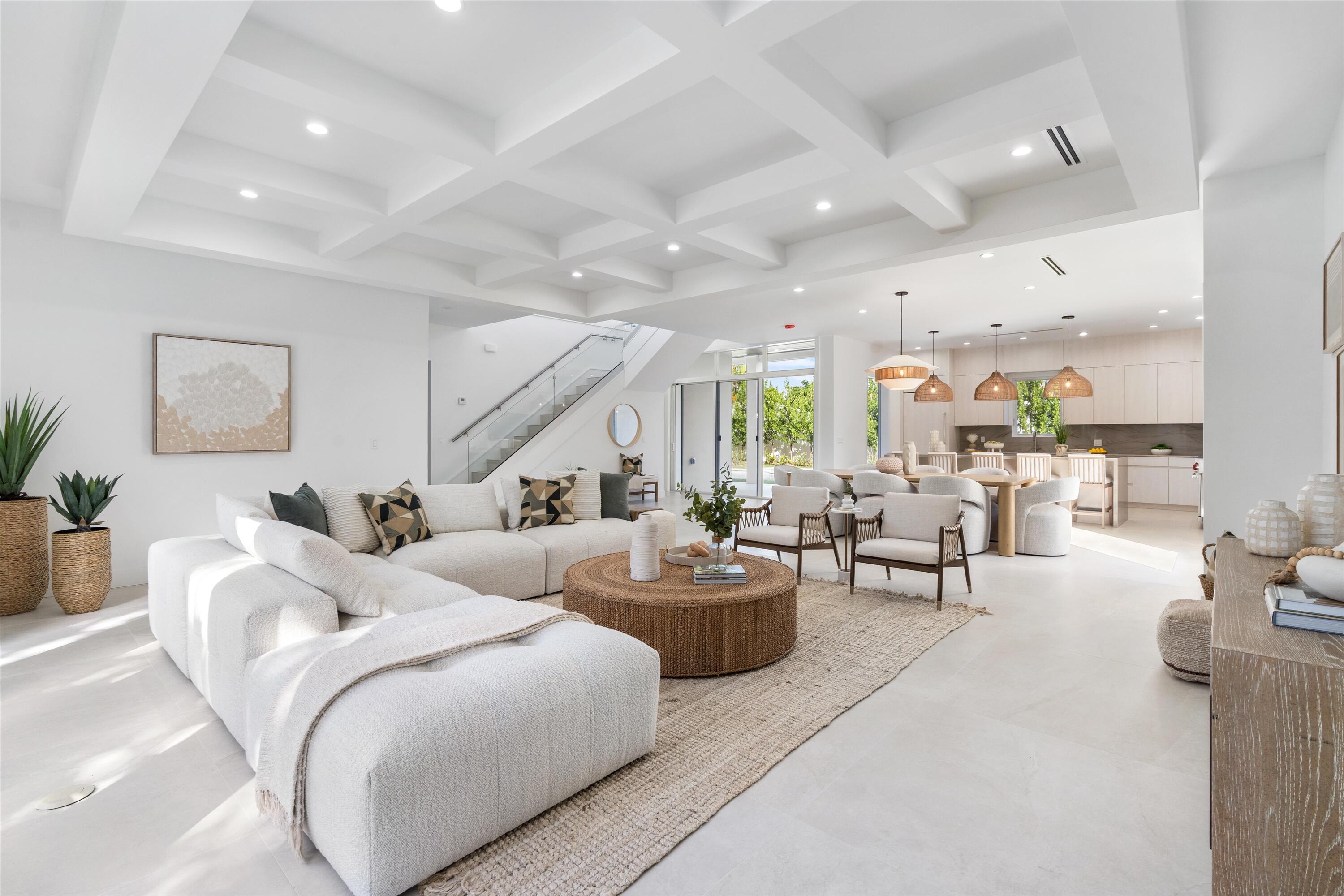 NEW CONSTRUCTION, stunning light-filled 4-bedroom home on the beautiful desired tree-lined street east of Olive in the evolving Southend neighborhood. Designer selections to add a warm touch to this amazing new residence with a large backyard. Close proximity to Palm Beach Island, multiple golf courses, local restaurants and the beach. Your new bright and airy home features an open concept floor plan with high ceilings, large bedrooms and walk-in closets, 2nd floor laundry room, heated pool w/spa attached 2-car garage.