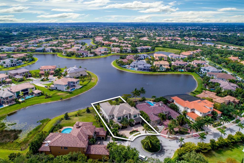 Custom, home by GL homes. Situated on an oversized lot with lakes views and south exposure. Interior features include, Control 4 smart home technology, Crestron system, electronic shades, hardwood and marble floors, LED lighting, media room with Dolby 7.2 theater, mud room, security cameras, UniFi UAP wireless Access Point devices throughout home for maximum wifi signals, washer & dryer on first and second floors, custom floors in the garage & extra storage, a chef's kitchen with Viking and Wolf appliances, and summer kitchen to entertain. The master includes his and her closets, lavish master bath, and private balcony with views of the lake.