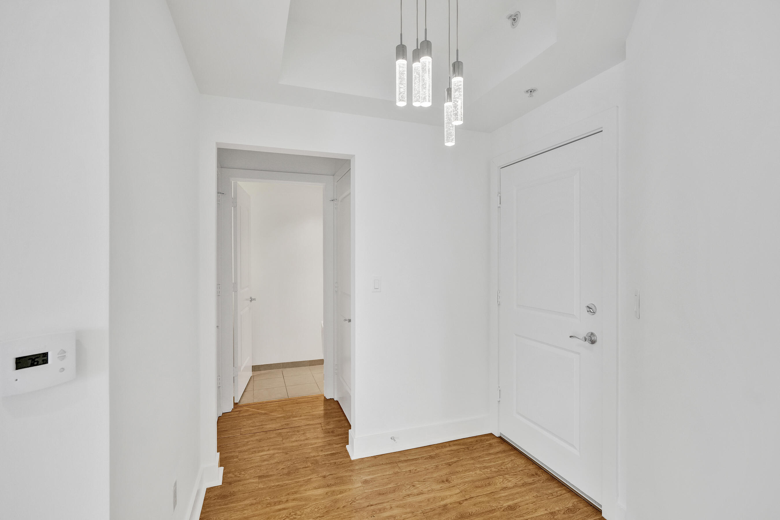 This beautifully recently painted corner unit comes with 2 assigned parking spaces and features 2 beds, 2.5 baths, open-concept living, a modern kitchen, floor-to-ceiling impact glass, high ceilings, and abundant natural light. Enjoy stunning downtown, city, and partial ocean views from the living area. The primary suite offers a large walk-in closet and a spa-style bathroom with double sinks, a soaking tub, and a separate shower. The guest bedroom includes a private bathroom and generous closet space. Prime location—walking distance to Downtown, Las Olas, Flagler Village, Brightline station, restaurants, and shops. Just 15 minutes to FLL Airport and the beach. Pet-friendly building with resort-style amenities: gym, pool with hot tub, clubhouse, business center, 24-hour front desk, EV cha