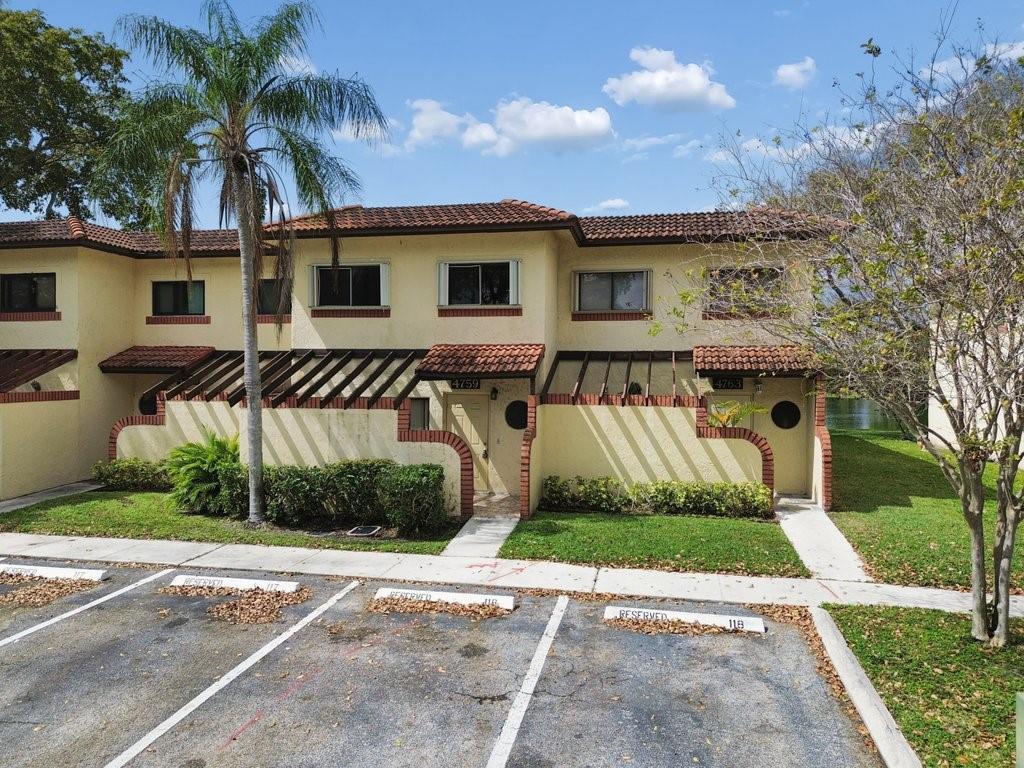 MOTIVATED SELLER! Price reduced to sell. LOWEST PRICED 3-bedroom, 2.5-bath waterfront townhome designed for comfort and convenience. The kitchen features granite countertops, stylish tile backsplash, and an eat-in area that opens to a charming front patio—perfect for morning coffee. The spacious living and dining areas create an open layout ideal for entertaining. Tile floors downstairs and plush new carpet upstairs, adding warmth throughout. The primary suite offers a large walk-in closet and a relaxing retreat. Unwind on the screened patio overlooking the tranquil lake. Community amenities include tennis courts, basketball courts, and a pool. Located minutes from shopping, dining, and Sawgrass Mills Mall. Homes like this don't last—schedule your showing today!