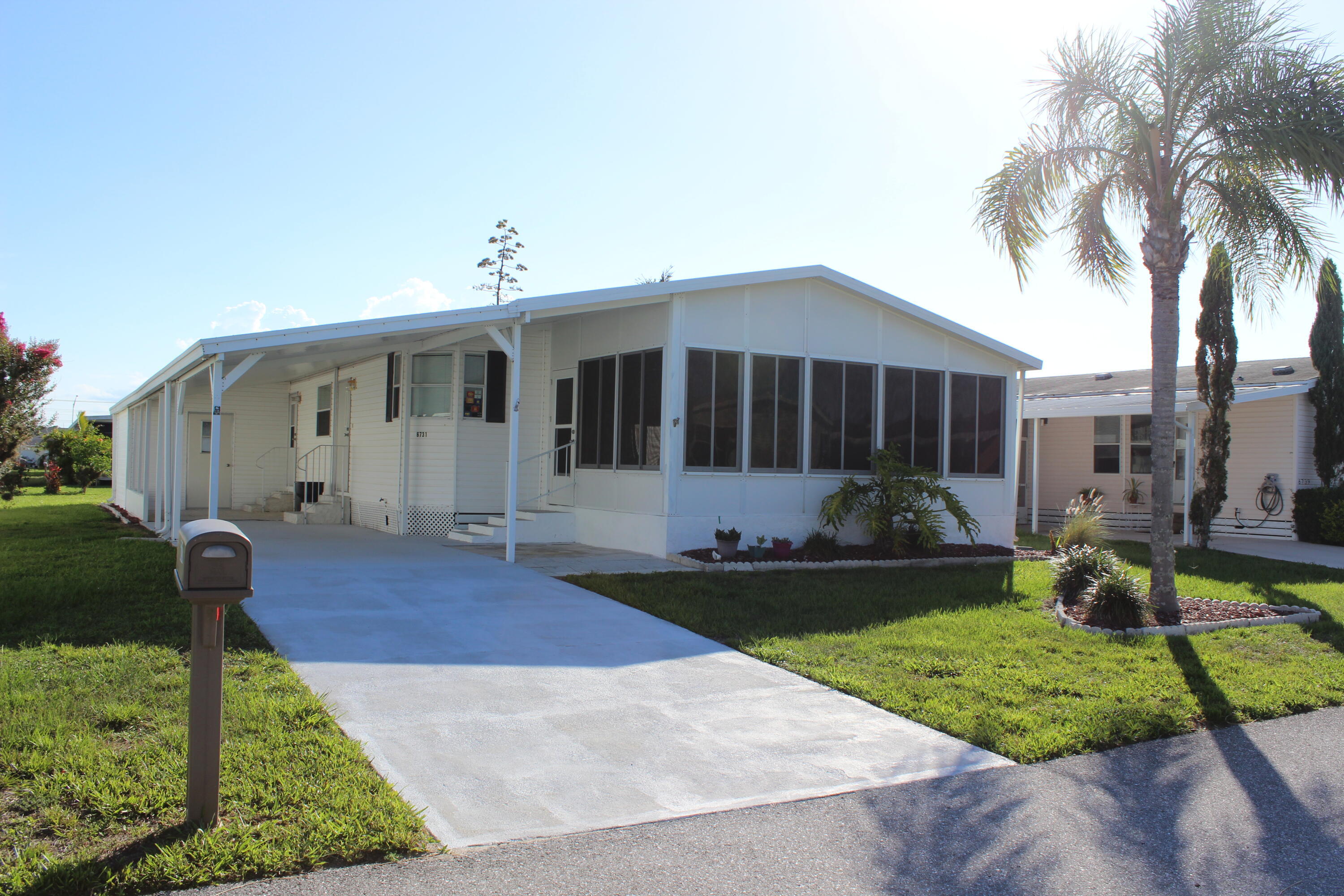 Welcome to 6731 Sinsonte Ct, a fully furnished 2-bedroom, 2-bath home in the 55+ community of Spanish Lakes Fairways in Fort Pierce. This well-kept home includes all major appliances—refrigerator, stove, dishwasher, microwave, washer and dryer—plus a 4-year-old A/C unit for year-round comfort. The open layout features a bright living/dining area, a full kitchen, and a private primary suite with ample closet space. The guest room is perfect for visitors, hobbies, or a home office. Enjoy relaxing on the screened-in porch and take advantage of the community's resort-style amenities: golf, tennis, pools, clubhouse, fitness center, and more—all included in the land lease. Perfect as a seasonal escape or full-time home in a vibrant 55+ neighborhood. Schedule your showing today!