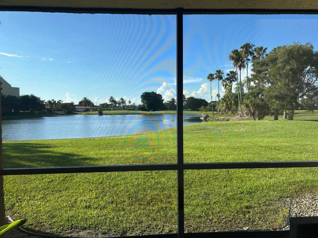 Enjoy the stunning lake and golf views in this rarely available first floor unit. This beatiful and extremely well maintained 2 bed-2.5 bathroom unit offers a spacious split-floor plan. The renovated interior includes ceramic and neutral vinyl flooring, new kitchen cabinets, stainless steel appliances, elegant white quartz countertops and updated bathrooms. New washer and dryer and an A/C unit in perfect condition. Well maintained and secure building located close to top-rated schools and shopping. The community pool and tennis courts are just steps away. A membership to the Bonaventure Town Center Club, with it's excellent amenities, is included in the purchase. The building is 40-year certified and has low maintenence fees and reserves for repairs.