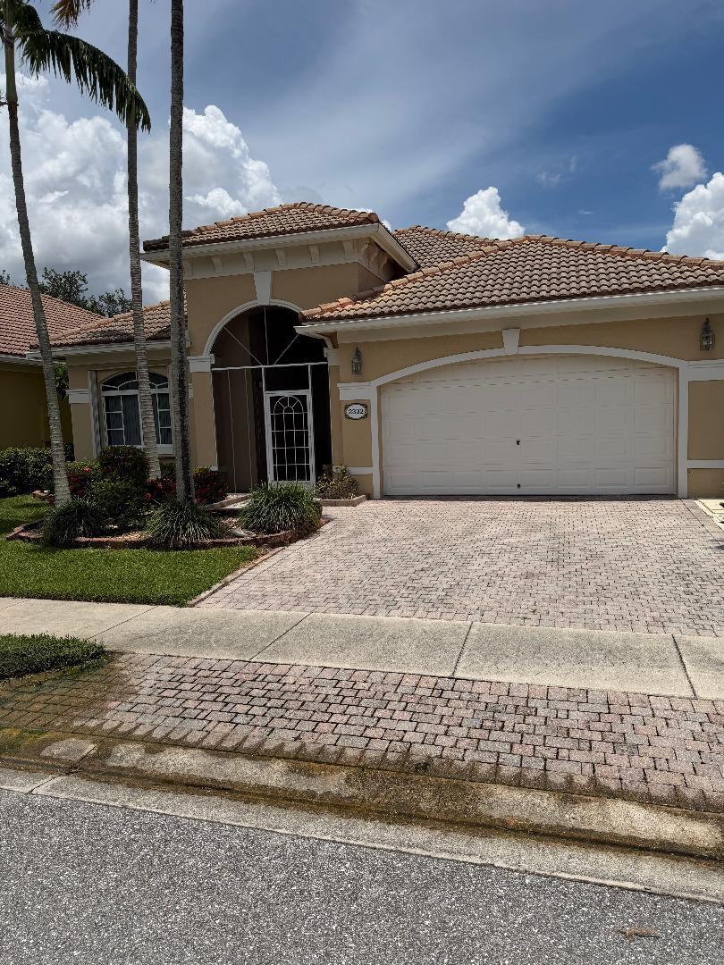 Rare 2//2/2 +Den Waterfront SFH with wide lake views in ultra convenient Andros Isle.  Well maintained by longtime owner, No carpeting, all hard flooring.  Covered/screened entranceway.  Large informal dining area overlooking lake.  Vovered/screened patio overlooking lake. Well managed HOA w no special assessments includes landscaping and irrigation, 24/7 staffed gate, in home security. WiFi, CATV, resort clubhouse w heated pool, spa, sauna, tennis, pickleball, bocce, playground. Private road to Publix Plaza.  Easy access to Downtown WPB, TPK, Airport, Cinema, hospital, restaurants and shopping.