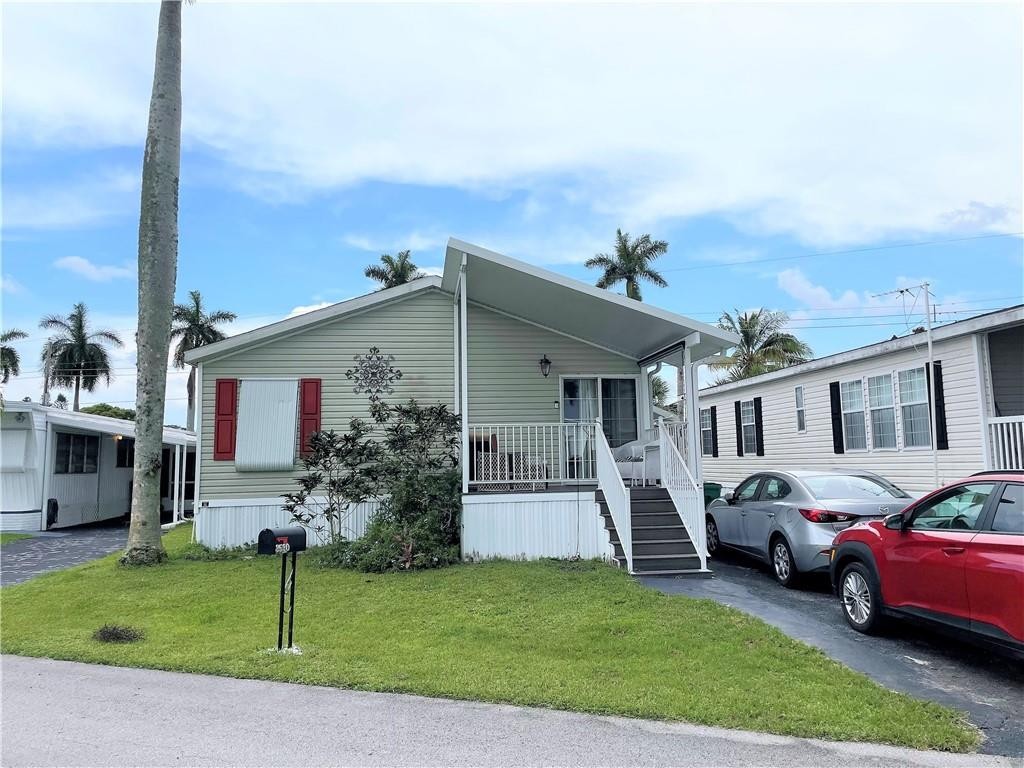 Beautiful 2/2 double wide built in 2005 - -open porch - shed - -bonus room/office - -split bedroom plan - -huge kitchen with washer and dryer  - mostly furnished  - -driveway can probably fit three cars - -range/oven should be replaced soon - -assoc. states it is HOPA verified - -priced right for quick sale