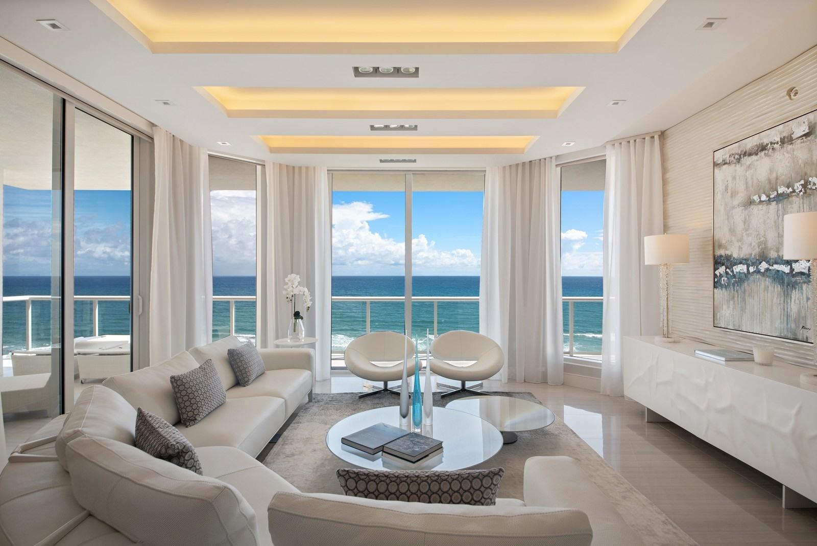 Only direct oceanfront non-developer unit available in the highly sought after building on Singer Island, VistaBlue. Boutique building with 58 residences and 19 stories, this residence has it all. Fully furnished with every bell and whistle, nothing  has been left out of this unit! It even comes with private 2 car enclosed garage. Almost 3300 in the interior living space with 10-foot ceilings, balcony overlooking the ocean on the 9th floor. Custom, high-end closets throughout, custom wall treatments, Lutron shades, Swarovski chandeliers, Sonos speakers throughout and high-tech TVs. This is living at its finest. The 3rd floor Residence Clun amenities are plenty with cabanas, spa/pool, wine bar, state-of-the-art fitness center with men's and women's locker rooms and sauna. 24-hour front desk and security. Please call us for a showing -- you won't be disappointed!