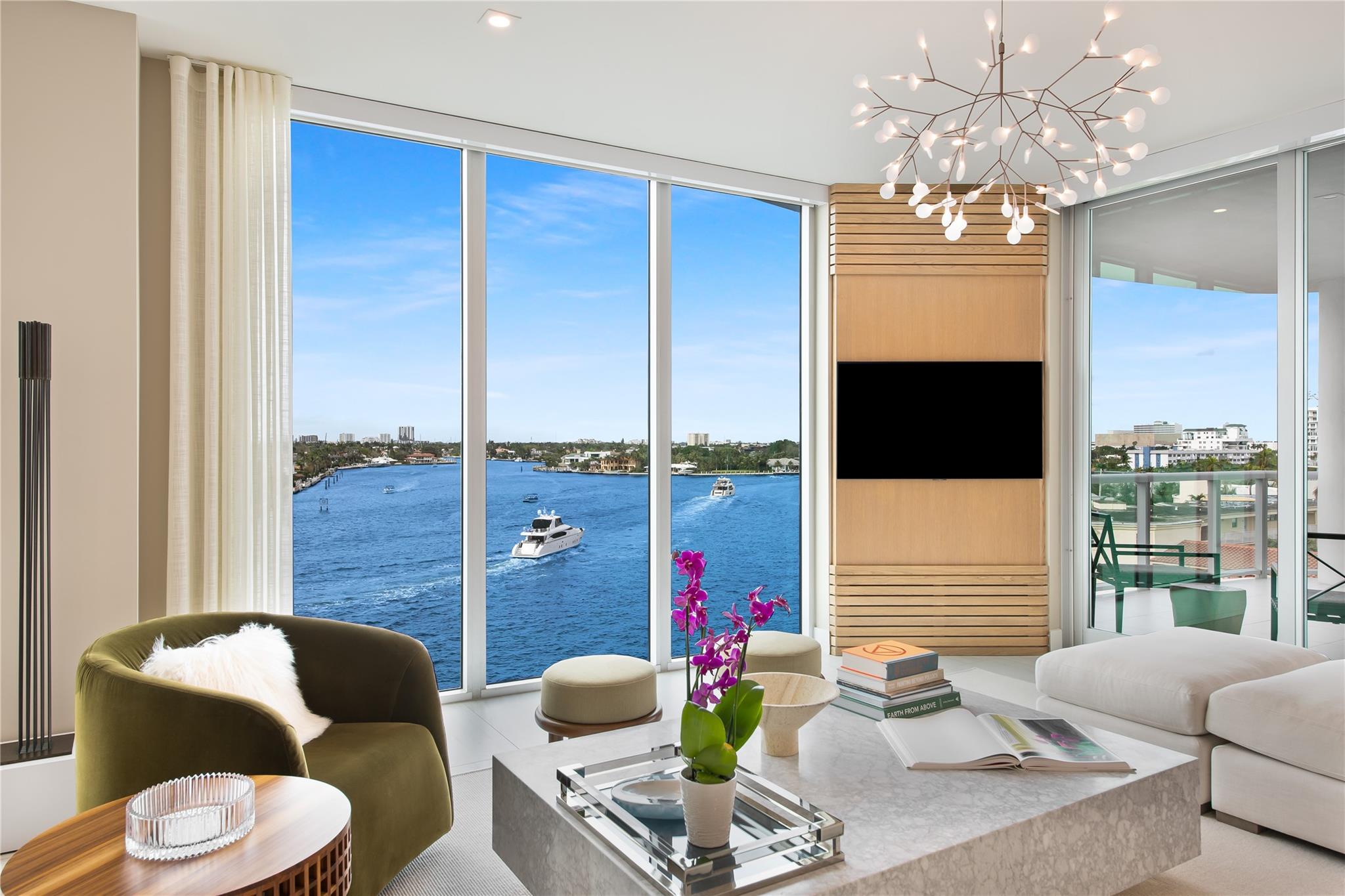 Indulge in the epitome of waterfront luxury living at 321 at Water's Edge. Constructed in 2020, this exclusive enclave of 23 condominium estate homes offers a lifestyle of luxury, with unparalleled panoramic views of the Intracoastal Waterway, Atlantic Ocean, and the Downtown Fort Lauderdale skyline. Unit 603 is one of a kind, with extensive upgrades and improvements to enhance your daily lifestyle. Here, you will find Italian cabinetry with an oversized kitchen area that includes an 80-bottle wine cooler, Gaggenau appliances, custom cabinetry that extends available storage, premium light fixtures, electric blinds, hand-dyed Philip Jefferies, wood paneling in the family room, fully built-out California Closest wood closets. Make 321 at Waters Edge home; you earned it. Furniture negotiable.