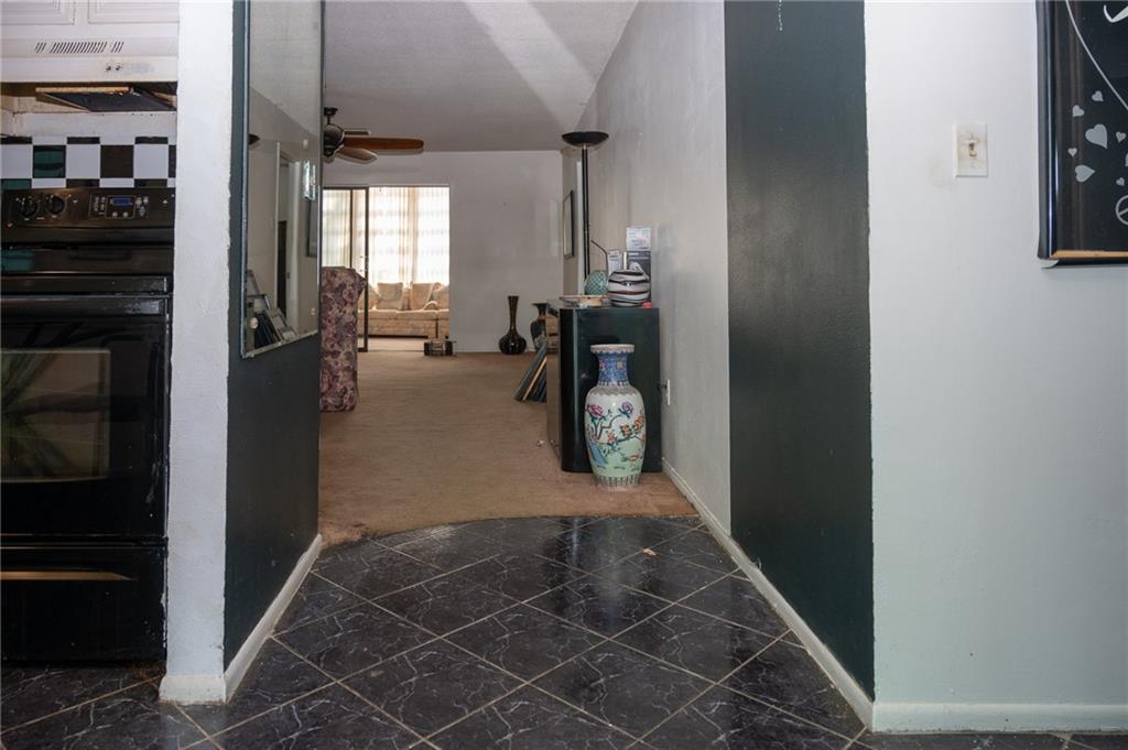 A spacious apartment that can be fixed up to make it your dream home. It has an open floor plan. The family room can be shut off by a sliding door. 55+ Community Mandatory Social Club required. Association requires 10% deposit.