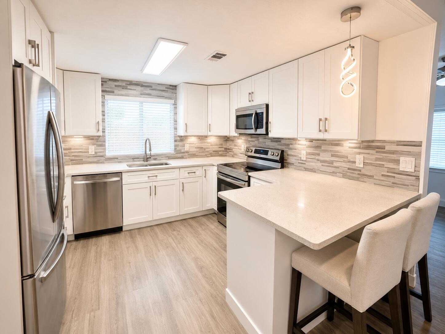 Move right into this beautifully renovated 2 bedroom, 2-bath double-wide home in a desirable 55+ gated community. Featuring a separate laundry room, modern finishes throughout, a spacious kitchen with ample spaces and dinning area - perfect for entertaining. Relax with your morning coffee in the screened room. Enjoy resort-style amenities including a heated pool, pickleball courts, and activities for every lifestyle. Peaceful, secure, and just minutes from shopping, dining, and everyday conveniences
