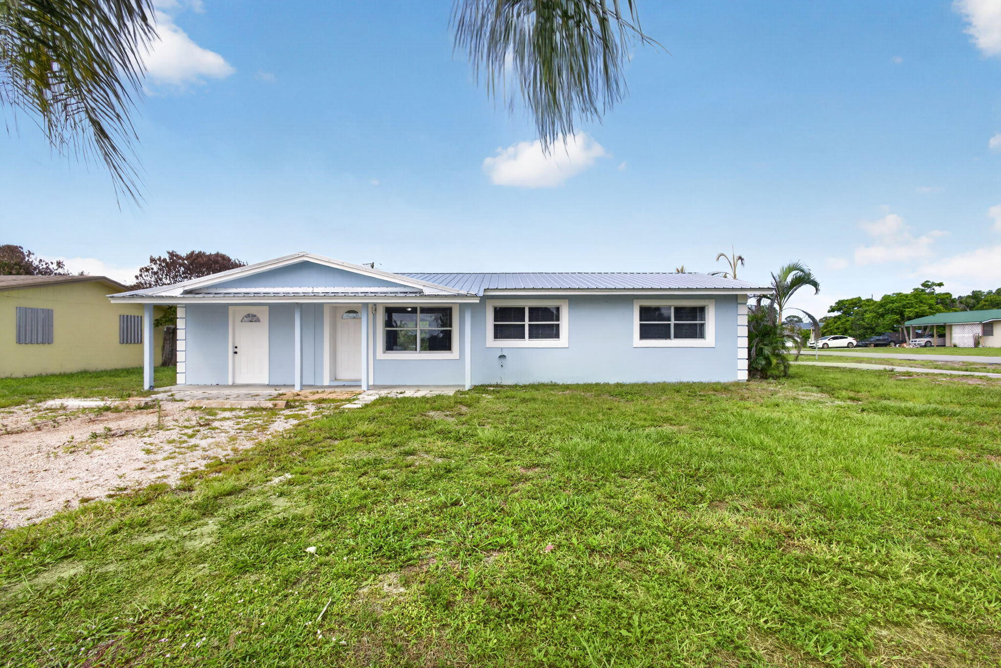 Welcome to this Charming Gem located in Indiantown, FL, offering 4 bedrooms and 1.5 bathrooms within 1,152 square feet of above-grade finished space. Situated on a corner lot totaling .23 acres. This single-family home has been recently remodeled which includes updated flooring, bathrooms, kitchen, new metal roof, etc. Perfect started home or Investment property. Indiantown offers a rare combination of "old Florida" charm, affordable land, and strategic access to major transportation corridors, making it an excellent location for future investment.