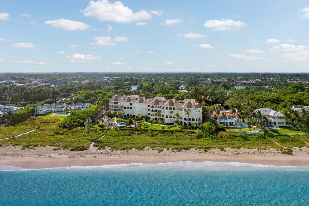 Ocean views await at this El Cortijo penthouse in Gulf Stream. Offering panoramic ocean vistas with desirable southeast exposure, this is a rare opportunity to update the unit and make it your own. Enjoy elevator access to foyer entry; seaside living room; formal dining room; office; primary bedroom suite overlooking the ocean with two baths; and two additional en suite guest rooms. El Cortijo is a boutique condo with only 24 residences situated on over 300 feet of direct oceanfrontage. Enjoy the beachfront pool; private beach path; and underground parking. Less than two miles from E Atlantic Ave eateries and shops and a pleasant drive to Palm Beach via A1A. Offering endless possibilities, this El Cortijo unit lives like a single-family residence. Luxe coastal condo living at its best. FEATURES:
" Direct oceanfront location in El Cortijo condo
" Only 24 units
" Penthouse unit with southeast exposure
" 3 bedrooms / 4 full and 1 half baths
" 3,397 square feet under air / 3,552 total square feet
" Elevator access directly to foyer entry
" Formal living room with stunning ocean views
" Formal dining room with easy access to kitchen
" Kitchen has island; cooktop; lots of cabinet space; and access to screened terrace and laundry room
" Separate office
" Oceanfront sitting room with endless views
" Primary suite with ocean views; two separate baths; and walk-in closet
" Two en suite guest bedrooms each with access to screened terrace
" Powder room located just off entry hall
" Seaside pool with lots of room for lounging
" Private beach path to the ocean
" Two under-building garage spaces
" Lobby entrance for guests
" Town of Gulf Stream has its own Town Hall and police department with patrol

Make this El Cortijo penthouse unit your coastal dream residence.