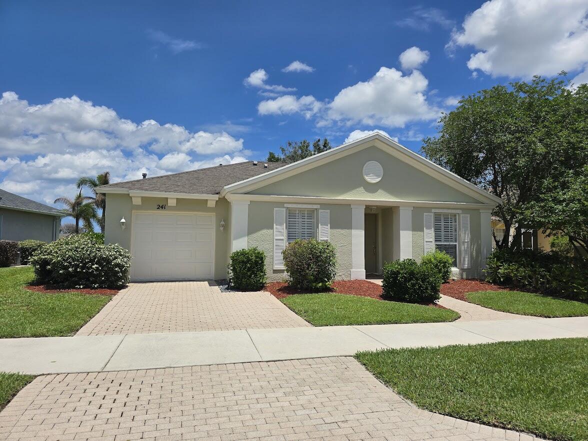 Waterfront living at its best in the highly desirable gated community of Lake Forest at St Lucie West! Former model home offers 2 bedrooms, 2 bathrooms, and 1,240 square feet of comfortable Florida living with beautiful lake views. i Ideally located just steps from clubhouse and pool, this residence provides the perfect blend of convenience, relaxation, and resort-style ammenities. Enjoy an outstanding community lifestyle featuring two pools, fitness center, hot tub and beautifully maintained surroundings. The low HOA fee includes LAWN & CABLE, making this home an exceptional value. Perfectly situated minutes from St Lucie West shopping, dining, golf, Clover Park Stadium, I-95 & Florida Turnpike. Whether you are seeking a full-time residence, seasonal retreat. SELLER FINANCING AVAILABLE!  Short Term Seller Financing. Freshly Painted Exterior.