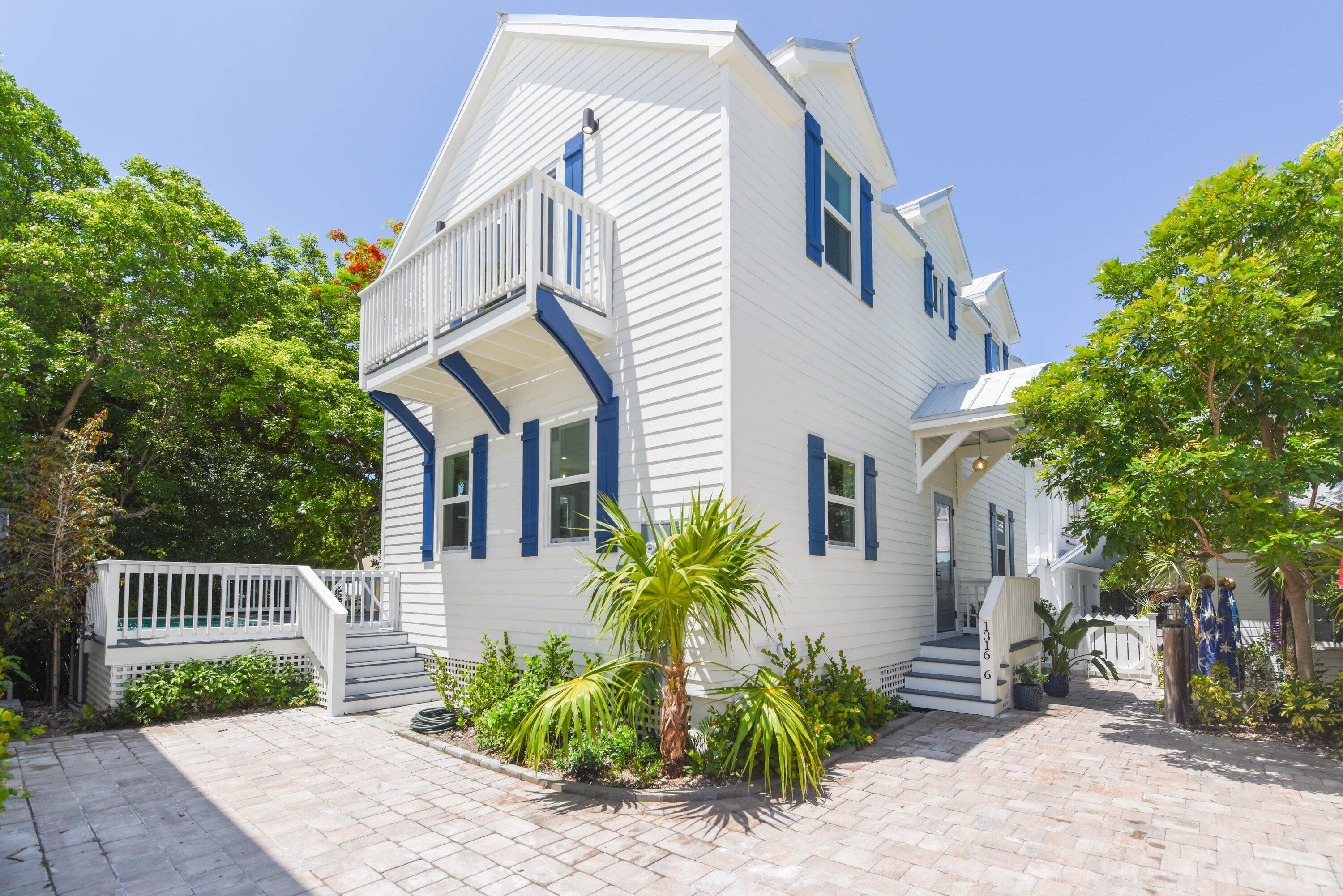 Brand-new construction in one of Key West's most desirable residential neighborhoods, the Casa Marina area of Old Town, just blocks from upper Duval Street and four blocks from the beach. This 4 bedroom, 4.5 bath single-family home blends modern durability with relaxed island living, offering the ease of low-maintenance ownership in the highly sought-after X flood zone. Built in 2026 to Florida's toughest standards, the home features concrete board siding, impact doors and windows, and an elevated first floor. The construction is designed to withstand winds up to 180 MPH. Inside, spacious living areas with high ceilings flow comfortably to a private outdoor retreat with an inground pool and water features. All bedrooms are en-suite, with one located on the first floor. A $15,000 builder appliance credit allows you to choose the finishes and appliance brands, at cost, that best suit your lifestyle. Off-street parking adds everyday convenience, while reclaimed wood accents from the historic schooner Western Union bring a meaningful connection to Key West history into the architecture. Quiet, private, and close to everything, this home offers luxury, walkability, and the best of Key West living.