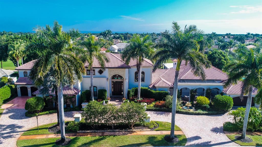 Luxurious double lot estate with more than 10,000 sq ft of living area, 7 large en suite bedrooms, 7 baths, 4 half baths,  3 garages, home theater, and library. Renovated in 2020 with meticulous attention to detail with the use of limestone, marble, porcelain, exotic parquet and hardwood Mahogany for various floors throughout this high end finished home. Fabulous modern chef's kitchen custom built 2020 with top of the line appliances including a 9ft professional hood. 14 ft center island gazes into huge temperature controlled wine cellar with 3000 bottle capacity. Large pantry and laundry room with additional subzero fridge. Three spacious screened porches and 2 wrap around balconies. 4 fireplaces. Marble pool deck surrounds 61 ft pool & spa overlooking golf view. All hurricane impact windows. Full house generator. The information herein is deemed reliable and subject to errors, omissions and changes without notice.  All measurements are approximate.